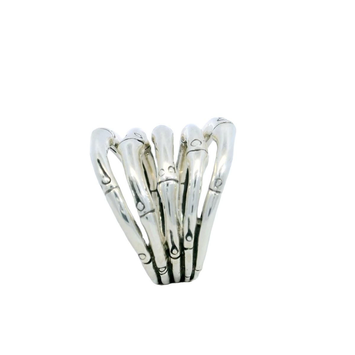 John Hardy Bamboo Ring Sterling Silver

This sterling silver ring by John Hardy features a distinctive bamboo motif, formed from five stacked bands designed to resemble natural bamboo stalks. Each band is intricately detailed, with subtle variations