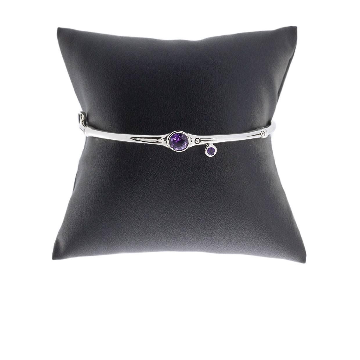 Each piece of John Hardy jewelry has been crafted in Bali since 1975. John Hardy is dedicated to creating timeless one-of-a-kind pieces that are brilliantly alive.

This sterling silver amethyst bangle bracelet is from John Hardy's Bamboo