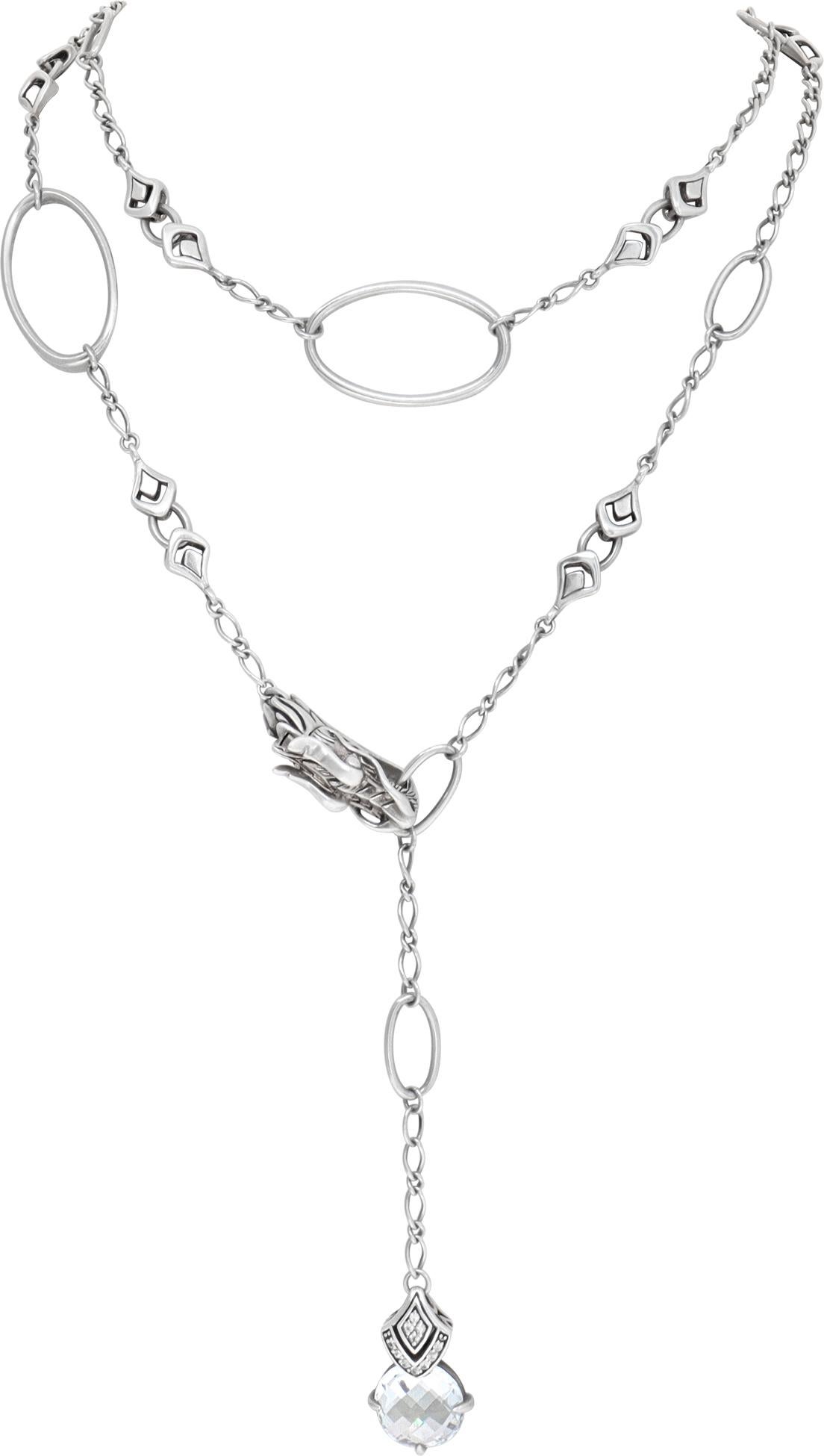 John Hardy Batu Naga Lariat necklace in sterling silver with single faceted white topaz and approximately 0.20 carats in white sapphire accents. Hinged dragon head clasp. 45 inch length.
