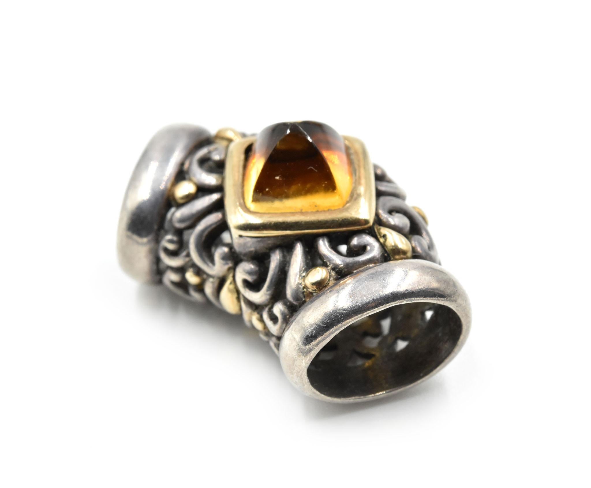 Designer: John Hardy
Material: sterling silver and 18k yellow gold
Dimensions: pendant measures 1-inch long and 1/2-inch wide
Weight: 8.61 grams
Retail: $750
