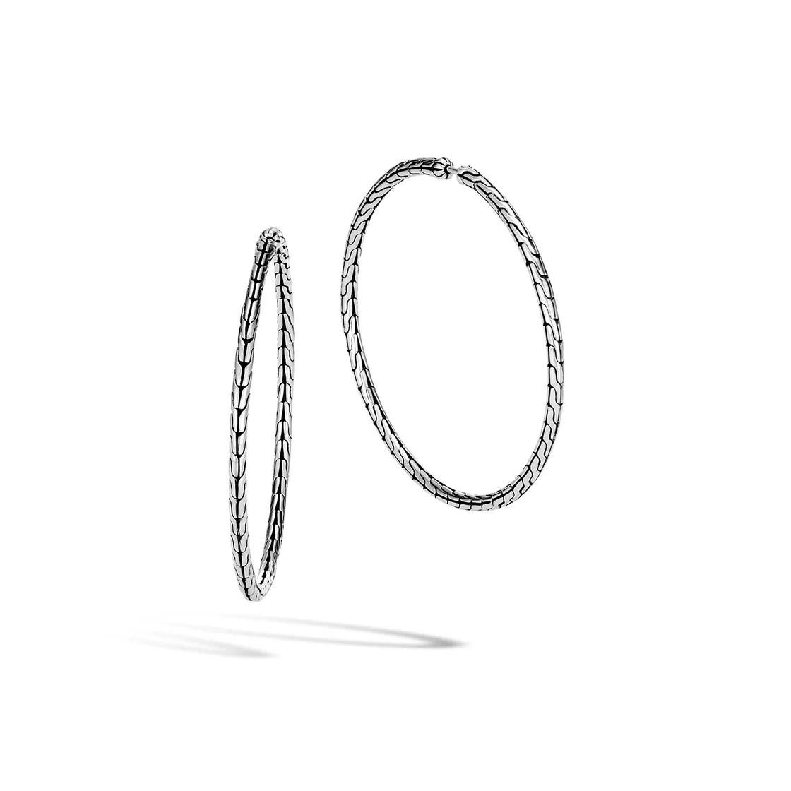 John Hardy craftsmanship radiates from these sterling silver hoop earrings! With a titanium hoop closure and a stunning 71.5MM x 71.5MM size, these earrings will make a statement wherever you go!

John Hardy
Sterling Silver Hoop Earrings
Metal: