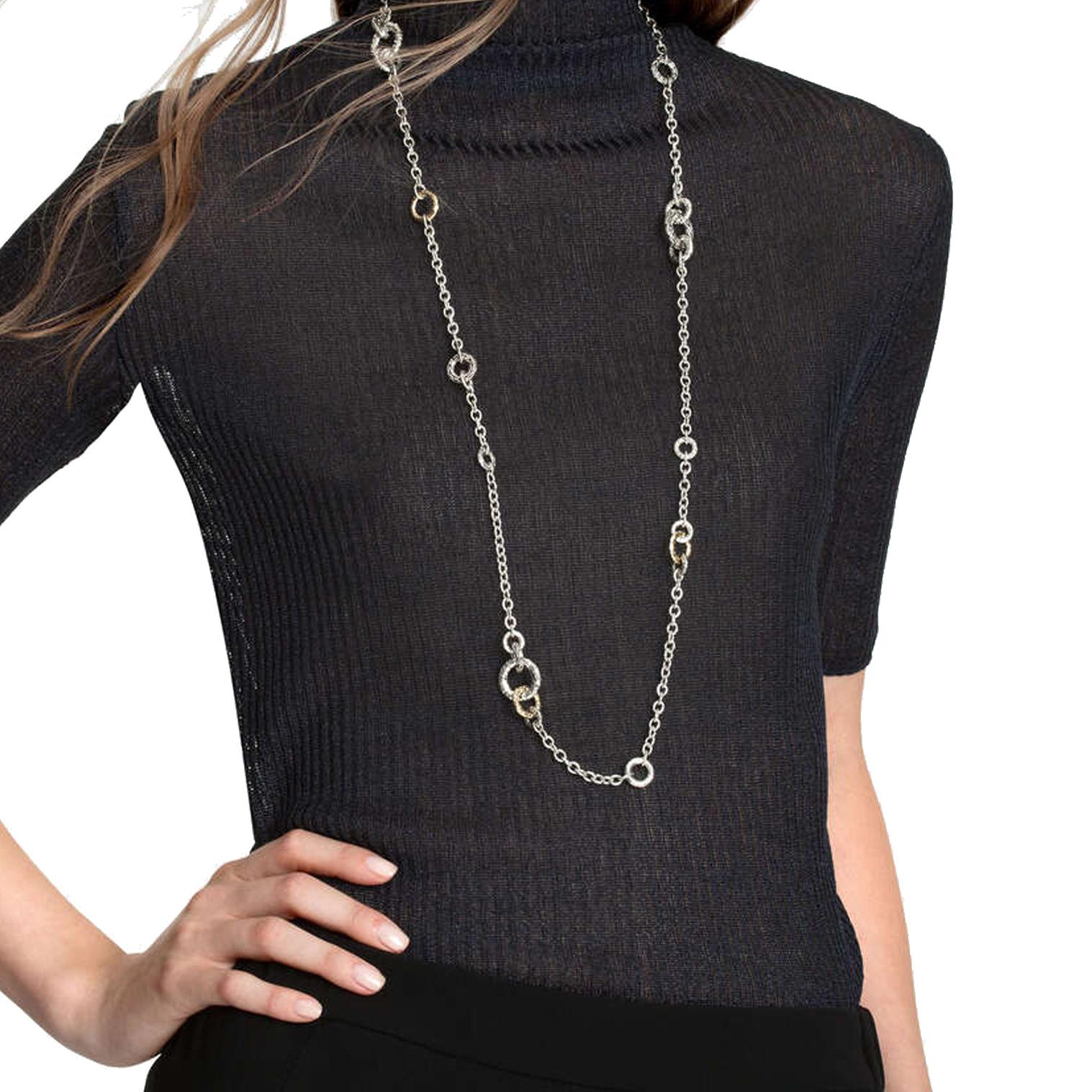 A necklace by John Hardy featuring 18k yellow gold mixed with sterling silver in this classic design. The necklace measures 36