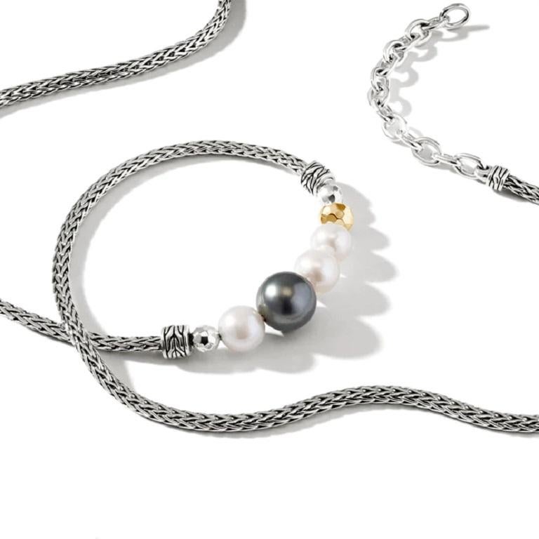Ladies John Hardy necklace. Sterling silver and 18 karat yellow gold. Classic Chain hammered mini chain necklace with 8-8.5mm Tahitian pearl and 6-6.5mm cultured freshwater pearl, 18-20 inch adjustable length.

Metal: Sterling Silver & 18k