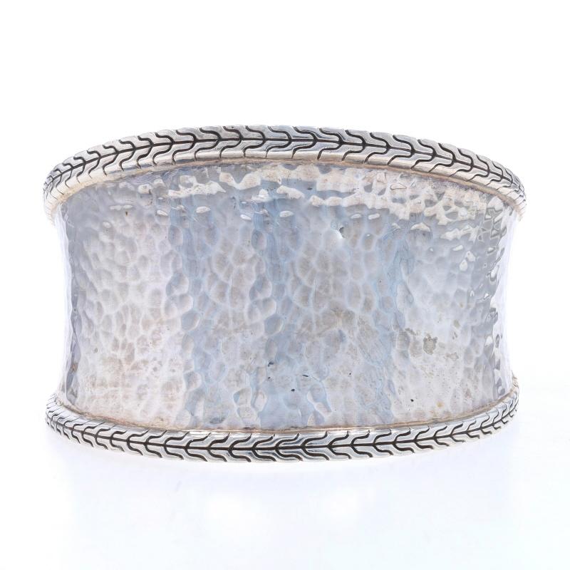 Retail Price: $795

Brand: John Hardy
Collection: Classic Chain
Design:  Wide Hammered Cuff

Metal Content: Sterling Silver

Style: Cuff
Fastening Type: N/A (slides over wrist)
Features: Contoured Silhouette

Measurements

Inner circumference