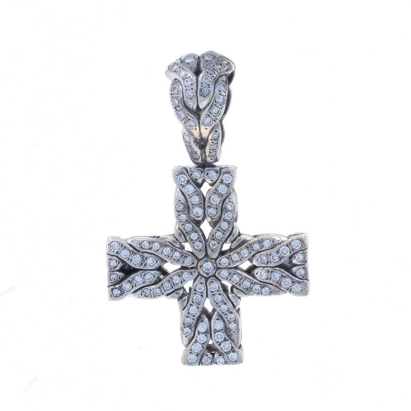 Brand: John Hardy
Design: Cross

Metal Content: Sterling Silver & 18k Yellow Gold

Stone Information

Natural Diamonds
Carat(s): .50ctw
Cut: Round Brilliant

Total Carats: .50ctw

Theme: Faith, Cross
Features: Open Cut Detailing

Measurements

Tall