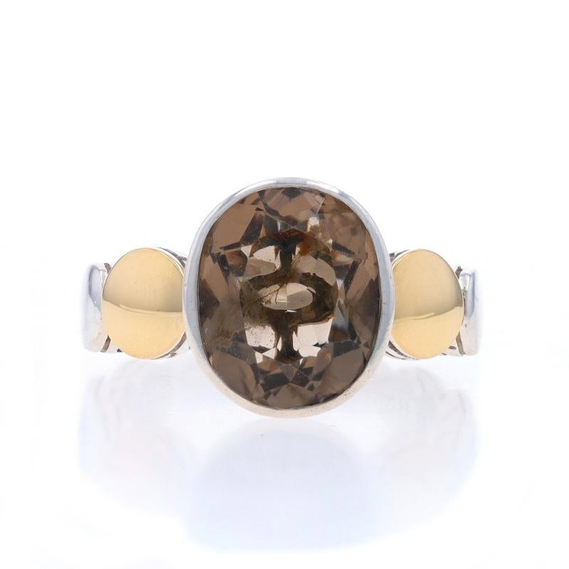 Size: 7 1/4
Sizing Fee: Up 3 sizes for $40 or Down 1 1/2 sizes for $30

Brand: John Hardy
Collection: Dot

Metal Content: Sterling Silver & 18k Yellow Gold

Stone Information

Natural Smoky Quartz
Cut: Oval
Color: Brown

Style: Cocktail