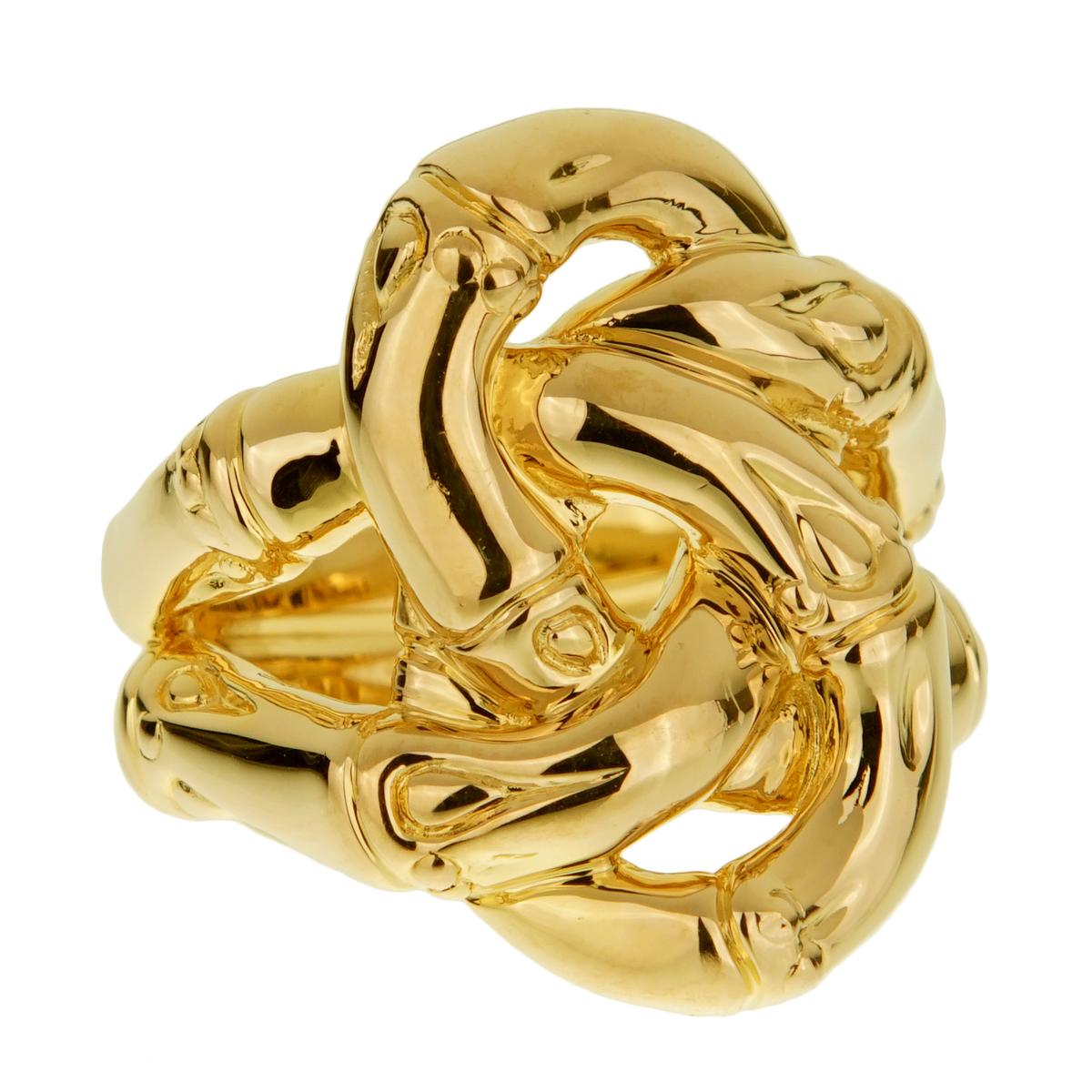 An iconic design by John Hardy showcasing a double bamboo knot in 18k yellow gold.