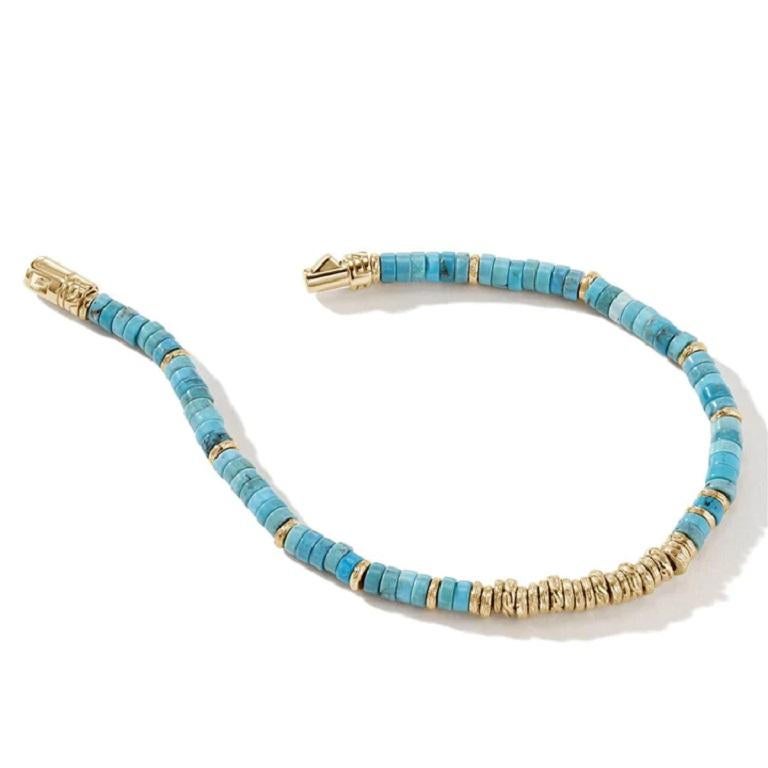 Turquoise and yellow gold beads compliment each other harmoniously in this fantastic unisex bracelet by John Hardy.

- 14K Yellow Gold
- Turquoise
- Width: 4MM
- Size: Universal Medium
- Pusher Clasp