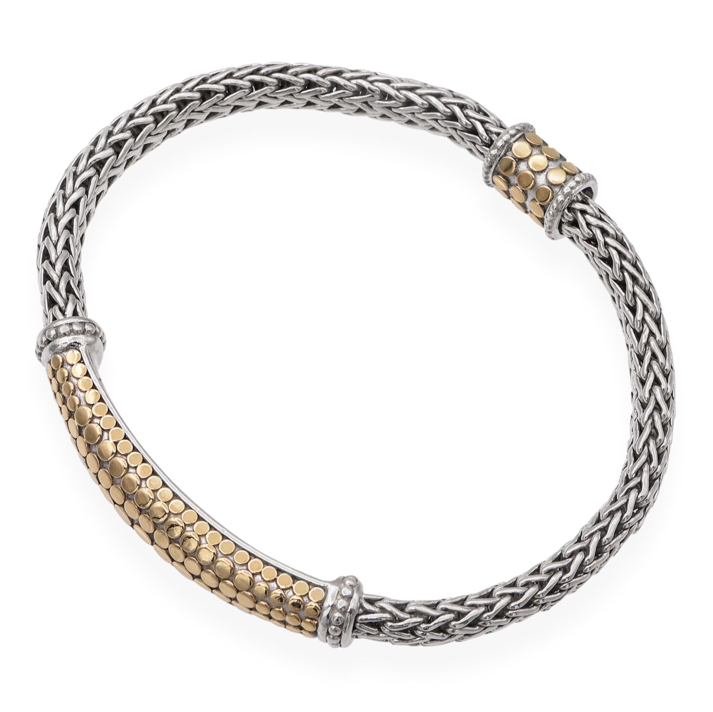 This bold and luxurious bracelet from John Hardy’s Icon Dot collection is a striking expression of craftsmanship and symbolism. Featuring a hand-woven sterling silver chain, the bracelet is centered with an eye-catching curved ID plaque inlaid with