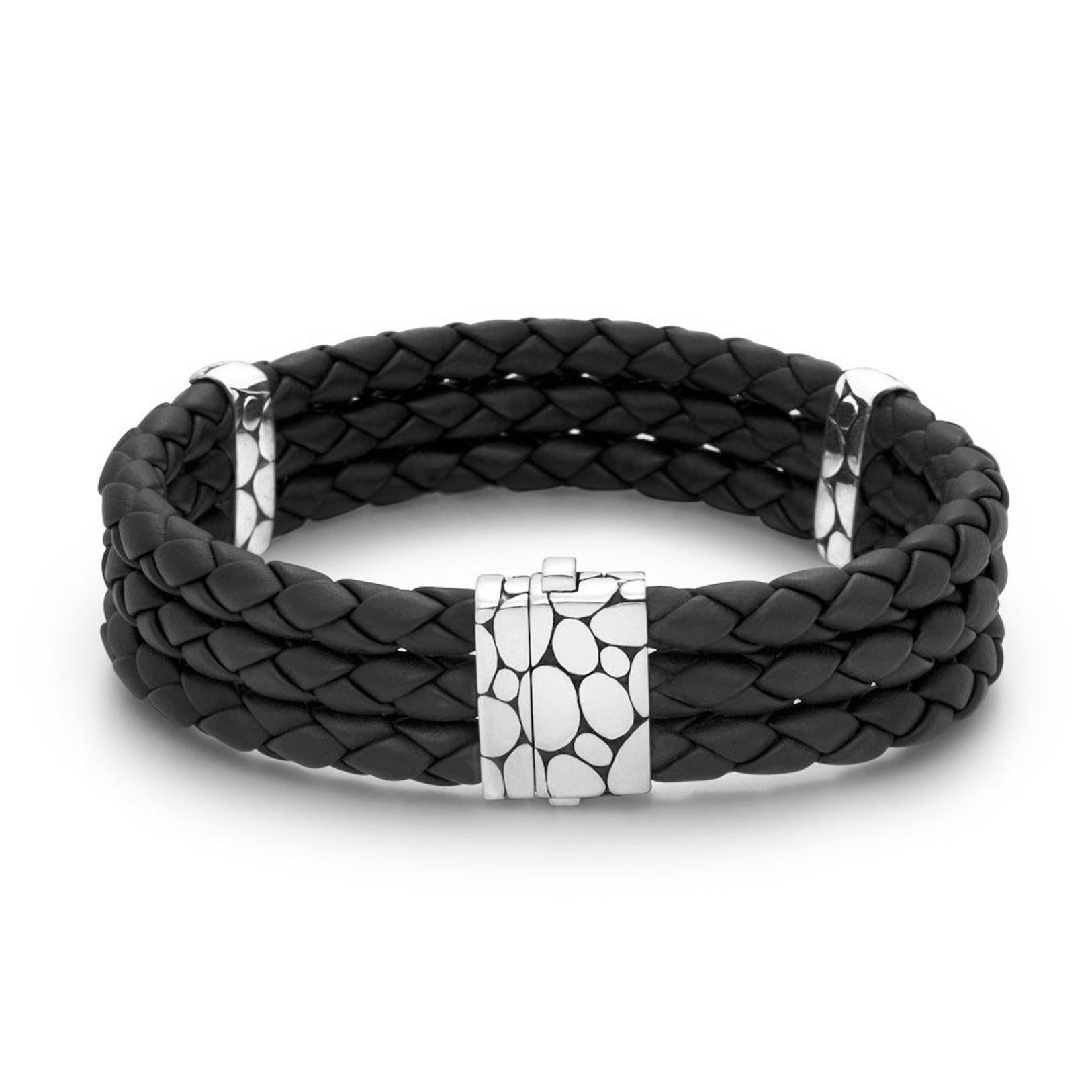 John Hardy triple row black leather bracelet with sterling silver detail clasp and two sterling silver stations.

7 1/2