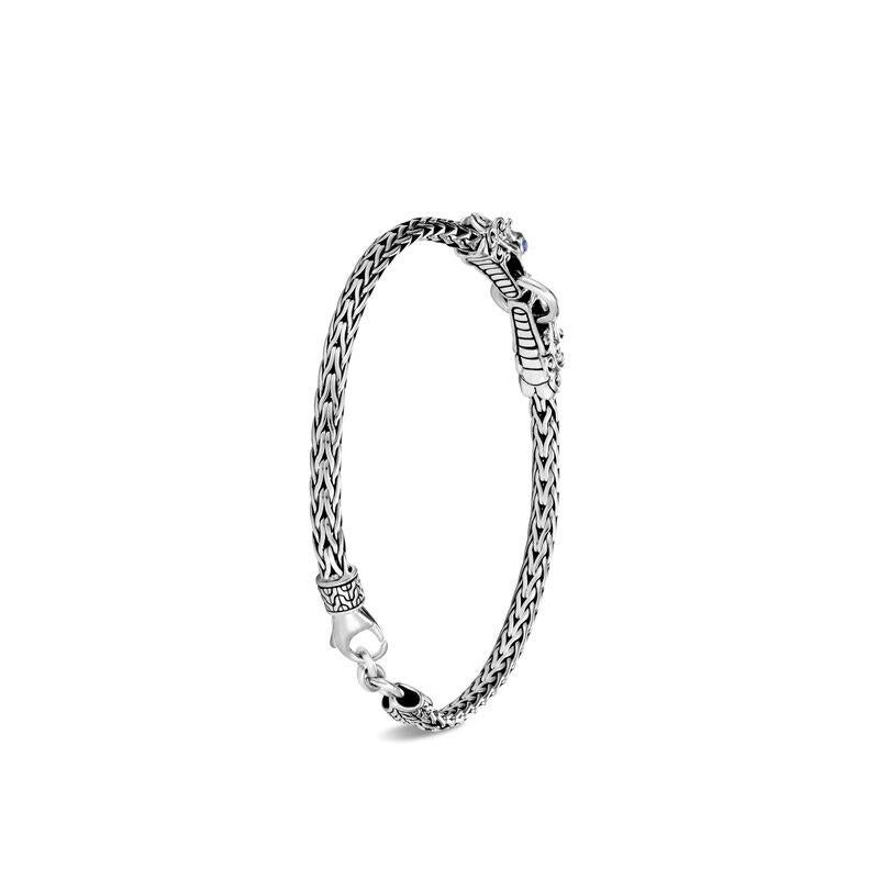 A must-have for any stack or the perfect start of a new one, this sterling-silver bracelet features a double Naga-head station that adds powerful dimensionality.
Sterling Silver
Bracelet measures 3.5mm wide
Station measures 32mm wide
Lobster