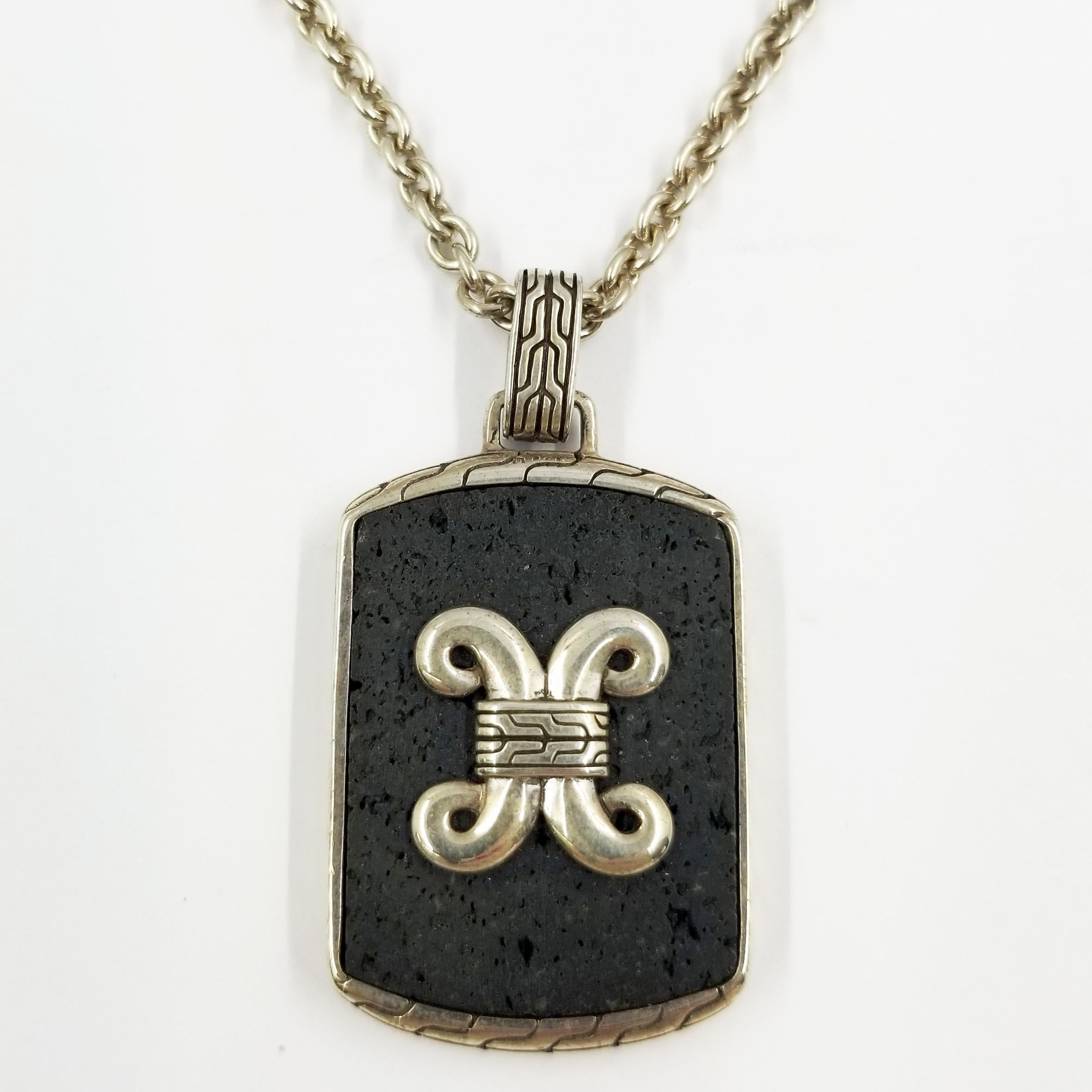 Sterling Silver 26 Inch Necklace with Dog Tag Pendant
Hand Assembled in Bali, Indonesia by John Hardy
Carved Volcanic Rock
Batu Dayak Collection
Stamped JH 925 John Hardy on Back of Pendant
Comes with John Hardy Pouch & Cleaning Cloth
Style