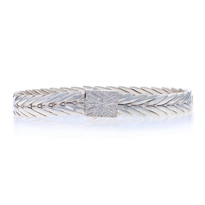 Retail Price: $1195

Brand: John Hardy
Collection: Modern Chain

Metal Content: Sterling Silver

Stone Information

Natural Diamonds
Carat(s): .09ctw
Cut: Round Brilliant

Fastening Type: Pusher Clasp

Measurements

Length: 7 1/4