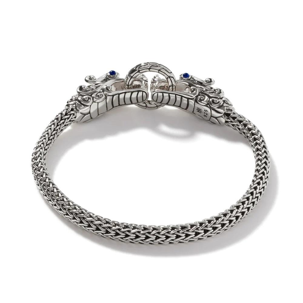 According to Balinese legend, Naga, the water dragon, symbolizes protection and prosperity. From our Legends Collection, Naga imbues this artisan-made bracelet with unmistakable meaning. Its blue sapphire eyes mesmerize.

Sterling Silver
Blue