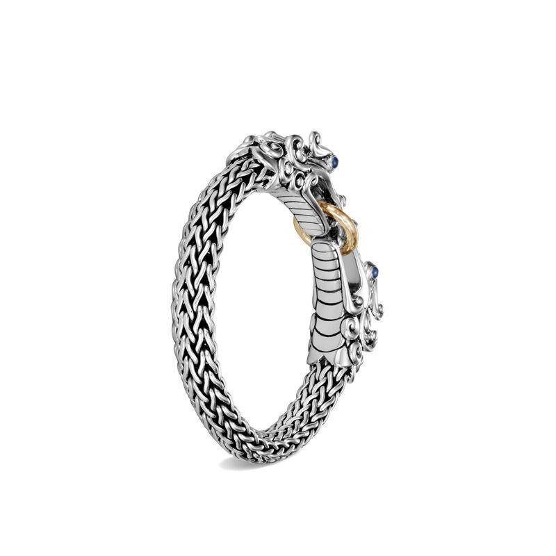 John Hardy Legends Naga Hammered 18K Gold & Silver Double Dragon Head 10.5mm Large Chain Bracelet with Blue Sapphire Eyes,
Sterling Silver and 18k Yellow Gold
Blue Sapphire
Bracelet measures 10.5mm wide
Station measures 74.5mm wide
Puller Clasp
Size