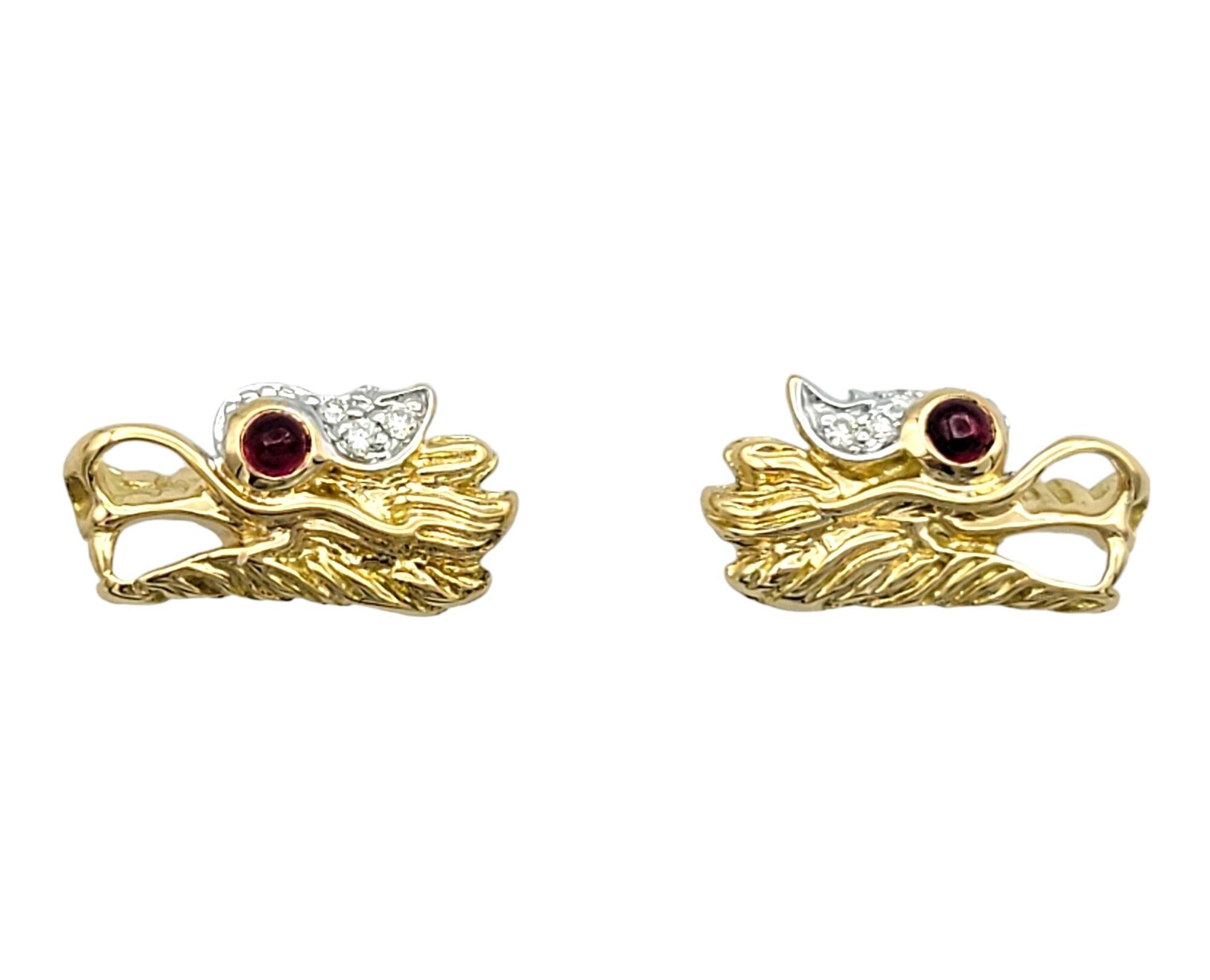 Discover the allure of mythical elegance with this exquisite pair of John Hardy Naga Legend dragon head stud earrings. Each earring features the iconic dragon head design, intricately crafted with attention to every detail. Embellished with tiny,