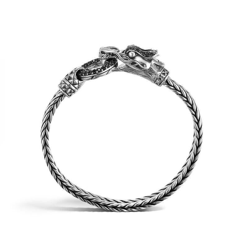 John Hardy Legends Naga Silver Lava Dragon Head Bracelet on Rectangular Chain with Black Sapphire.
Sterling Silver
Black Sapphire
Bracelet measures 7mm wide
Station measures 46mm wide
Size Medium
Puller Clasp
BBS65345BLSXM