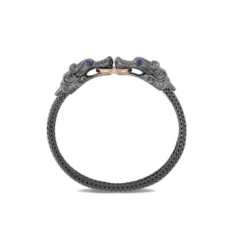 John Hardy Legends Naga Hammered Bronze & Silver 10mm Double Row Bracelet with Black Rhodium with Blue Sapphire Eyes.
Sterling Silver and Bronze
Black Rhodium Plating
Blue Sapphire
Bracelet measures 10mm wide
Station measures 68.5mm wide
Puller