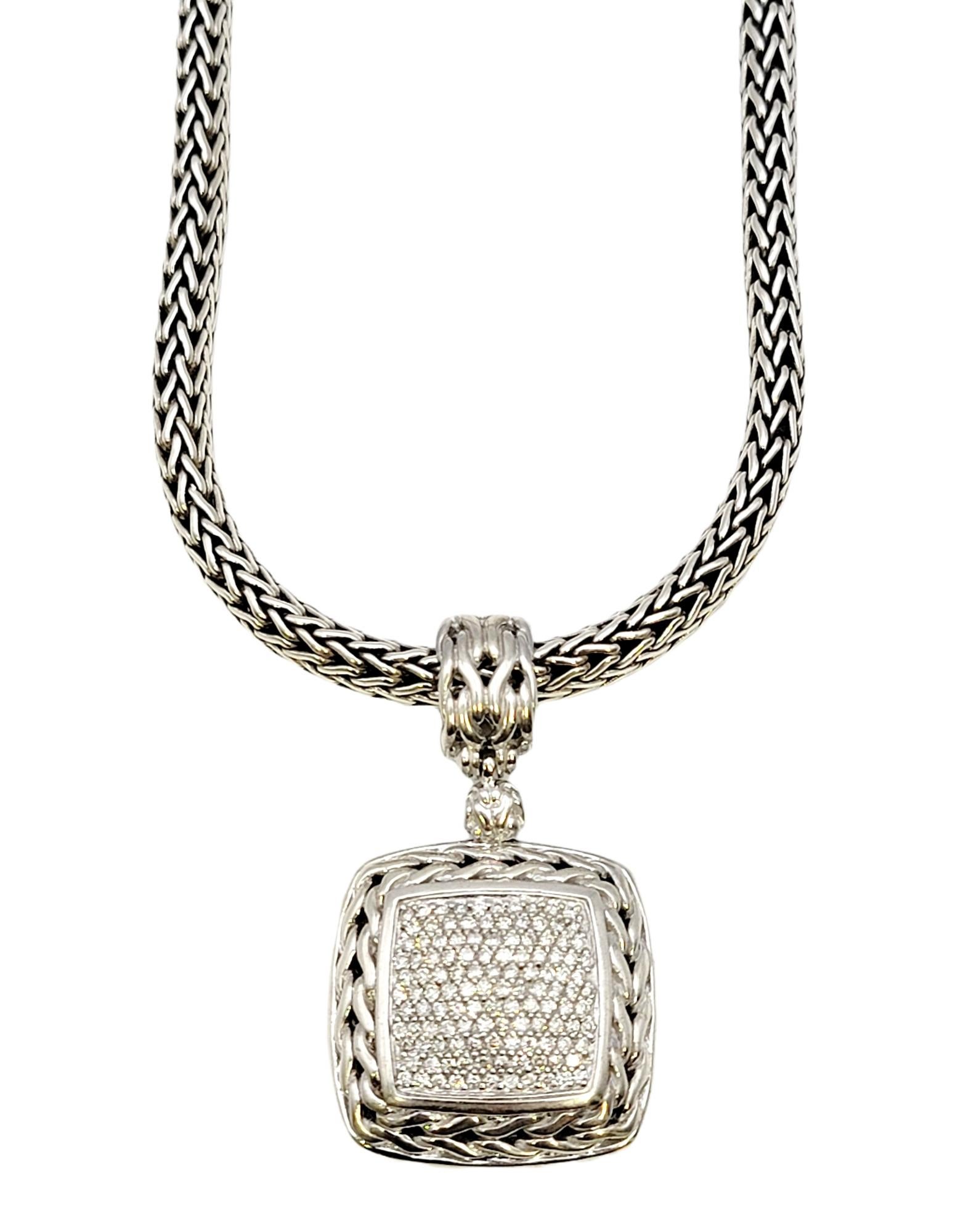 Gorgeous pave diamond and sterling silver necklace by famed jewelry designer, John Hardy.  Dazzling diamond detail fills the pendant while the polished sterling silver enhances the white brilliance of the stones. Hardy's signature braided chain