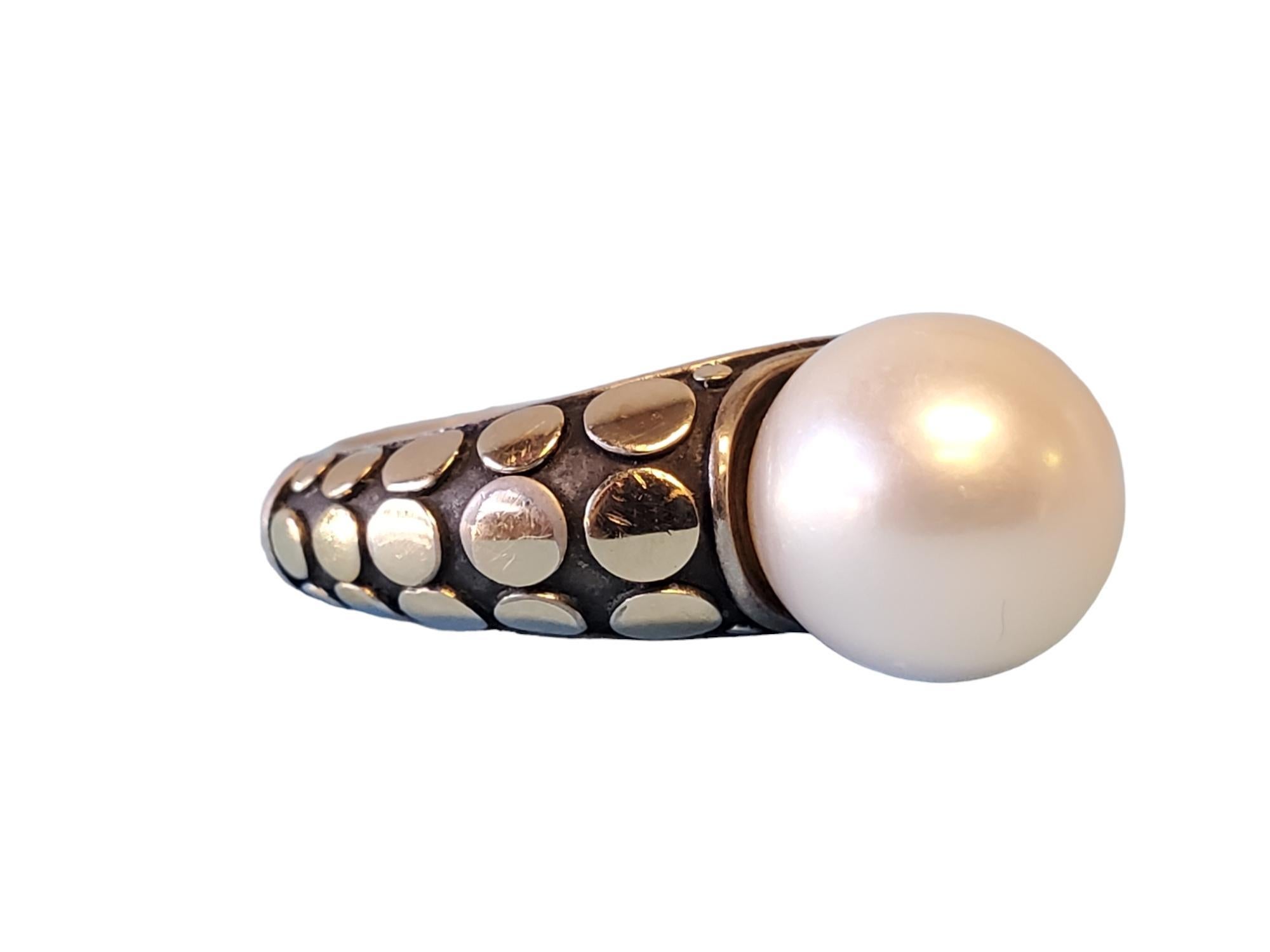 John Hardy Pearl Ring Sterling 18k Dot Pattern 

Listed is this special and rare John Hardy Pearl ring crafted in sterling silver with an 18k yellow gold dot pattern. This Hardy designer ring features a 10mm beautiful white pearl at the center and