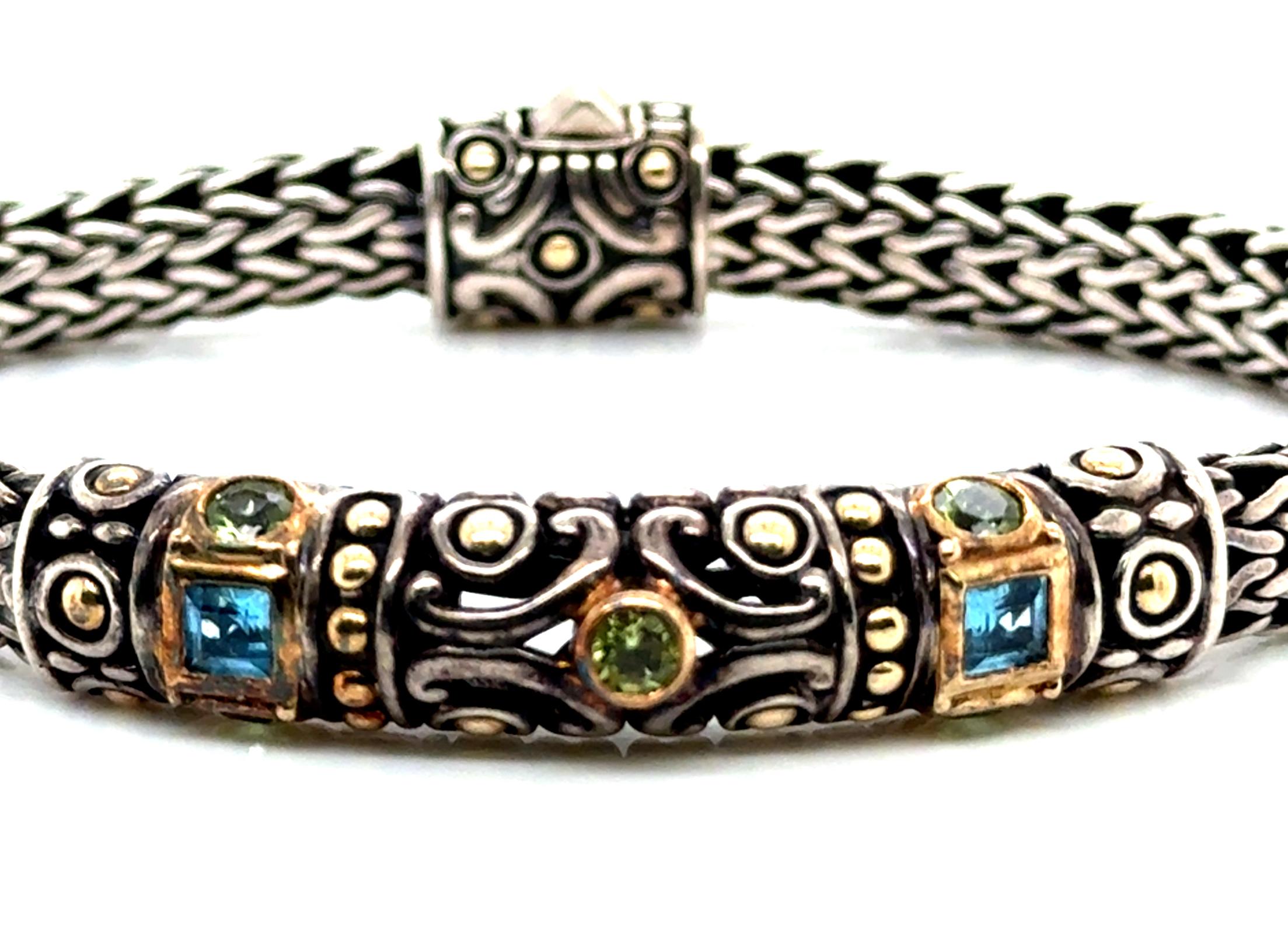 John Hardy Peridot and Topaz Bracelet Sterling Silver 18K Yellow Gold 6.5 Inch


100% Genuine John Hardy Sterling Silver Bracelet

Wheat Chain

Genuine Blue Topaz and Peridot Gemstones

Sterling Silver with 18K Yellow Gold Accents

Excellent