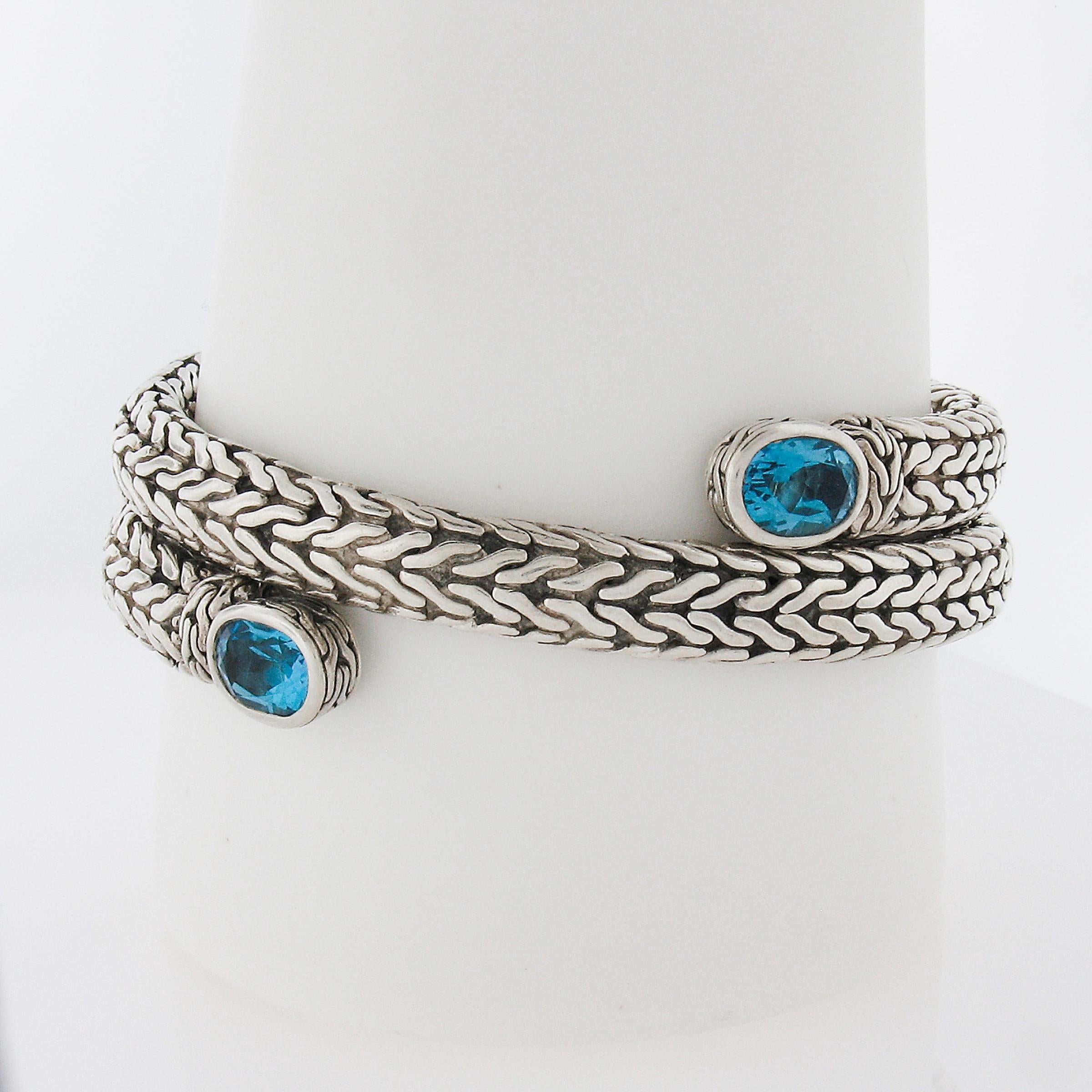 --Stone(s):--
(2) Natural Genuine Blue Topaz - Oval Shape - Bezel Set - Turquoise Blue Color - 8.7x6.2mm (approx.)

Material: Solid .925 Sterling Silver
Weight: 78.12 Grams
Chain Type: 5.8mm Coil Flexible Wheat Link Chain 
Chain Length: 6.75 Inches