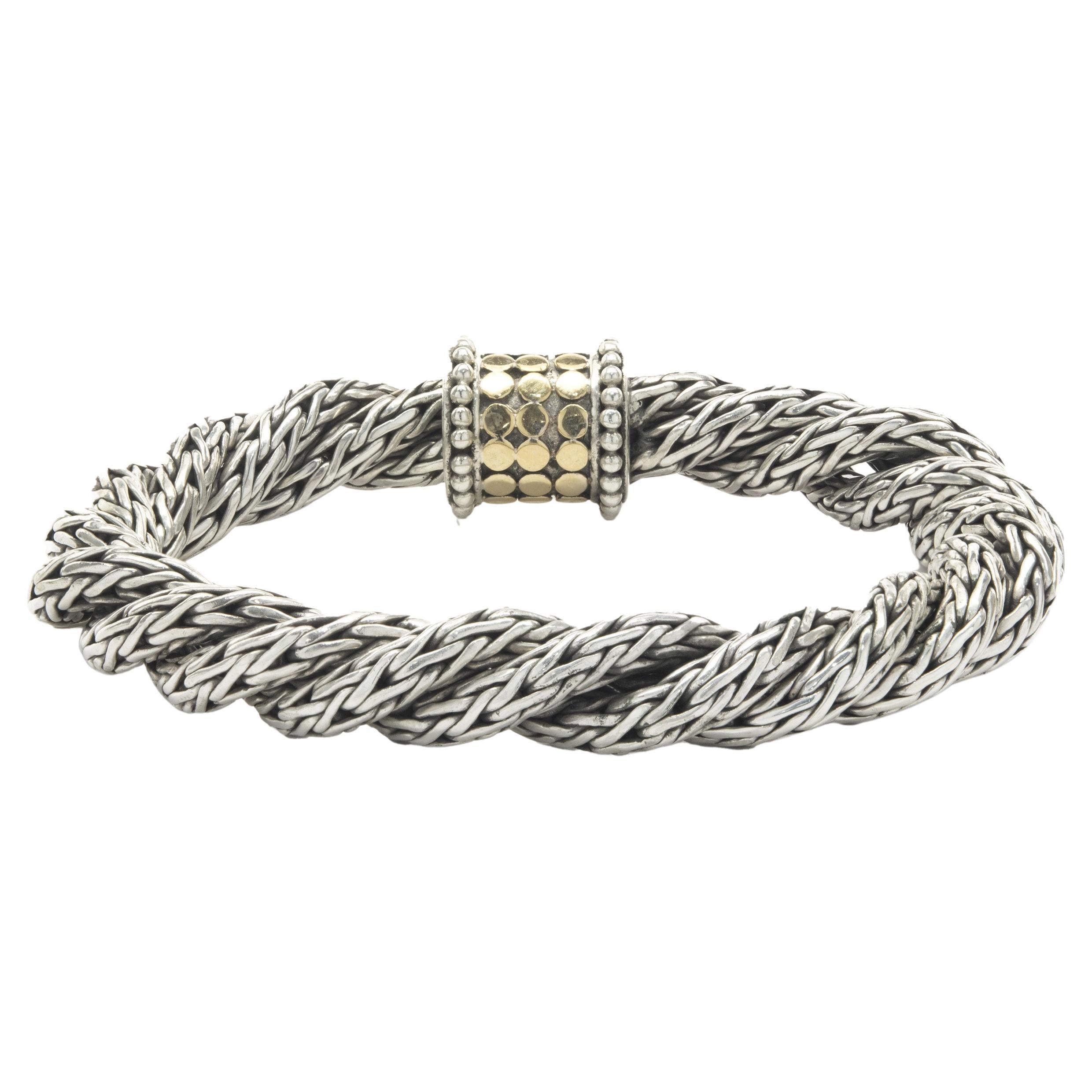 Designer: John Hardy
Material: Sterling Silver / 18K yellow gold
Dimensions: bracelet will fit up to a 7.5inch wrist
Weight: 67.95 grams
