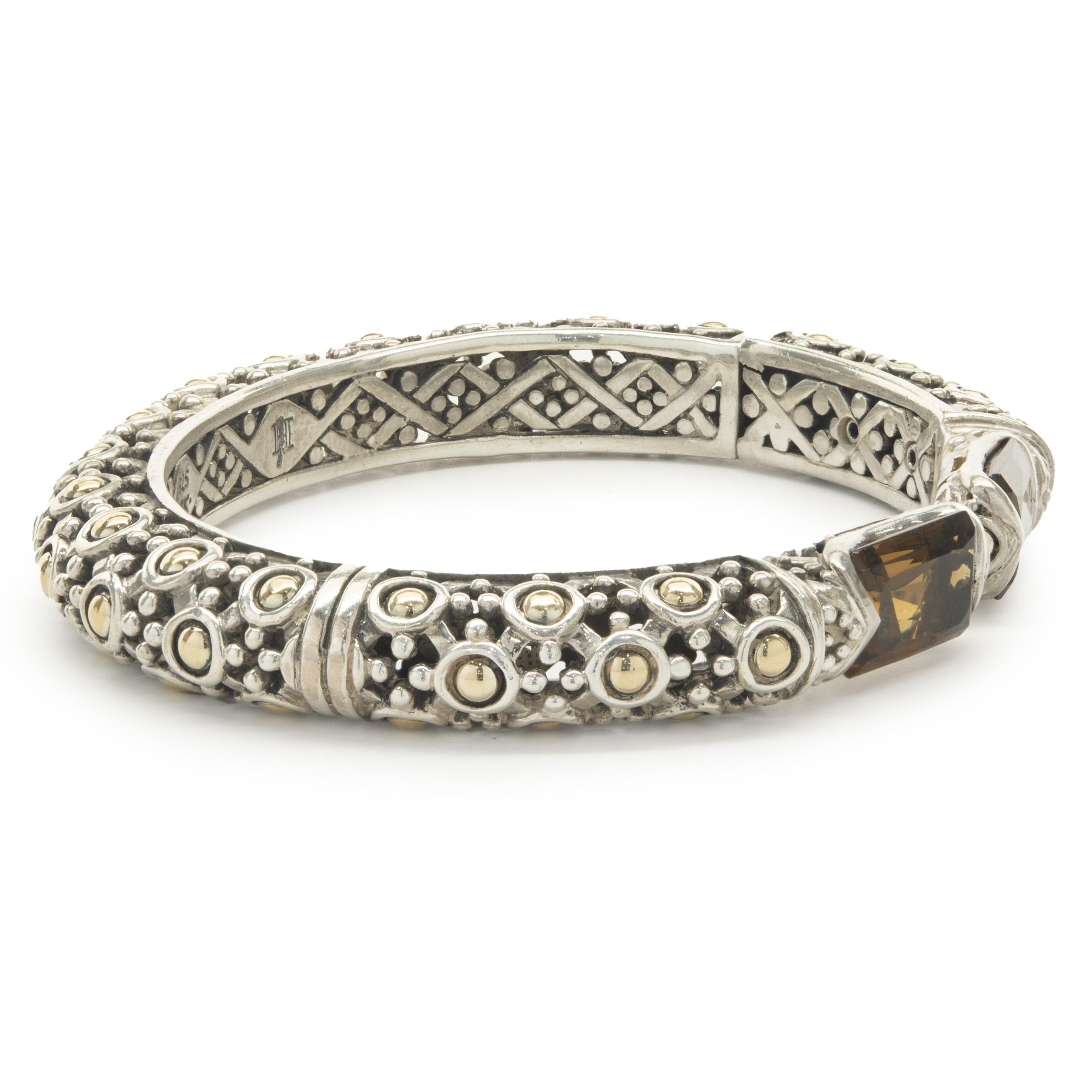Designer: John Hardy
Material: Sterling Silver / 18K yellow gold
Dimensions: bracelet will fit up to a 7-inch wrist
Weight: 45.37 grams