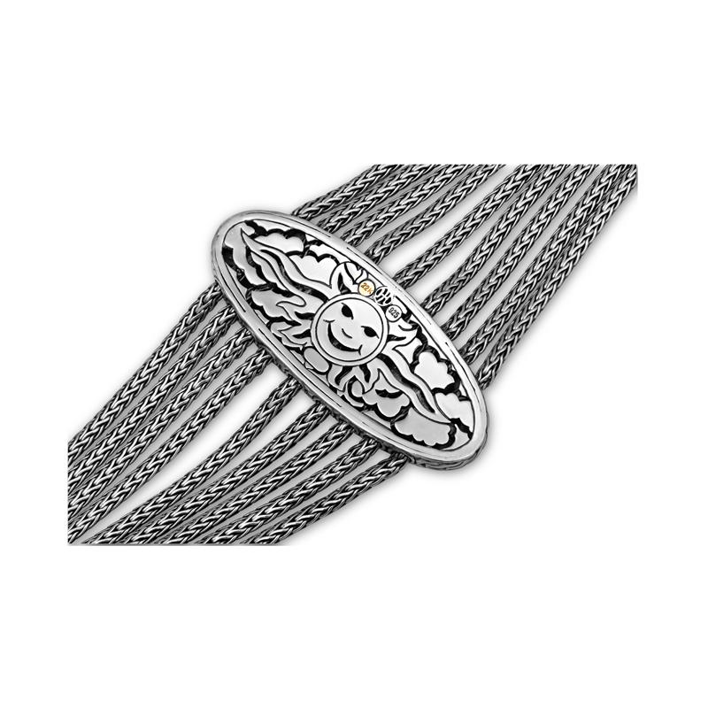 This beautiful retired and rare collectable John Hardy Palu bracelet has nine sterling woven silver strands on each side connected to a 22 karat gold center oval disc. Clasp closure. Fully hallmarked. The piece has signature metal work and classic