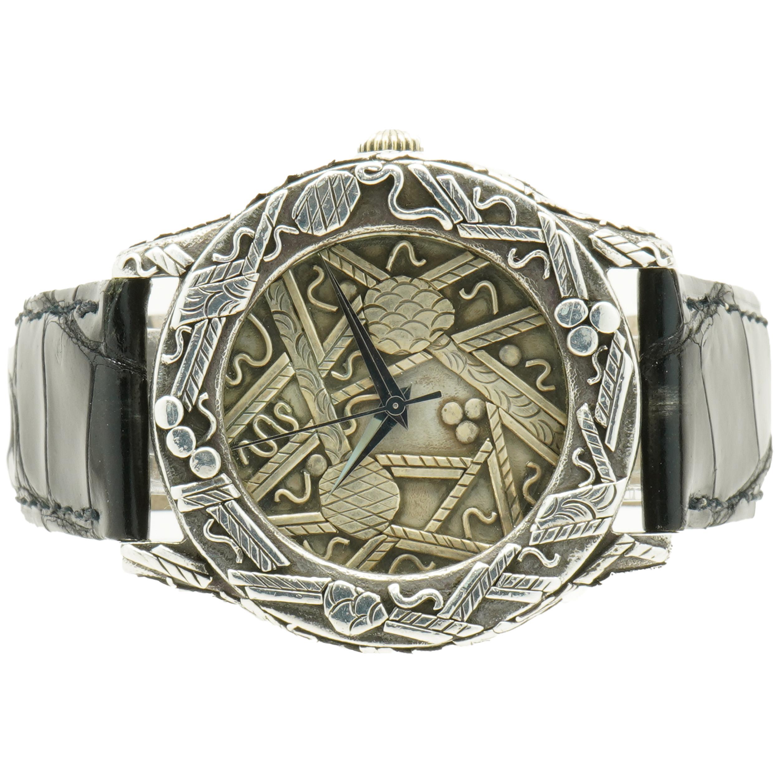 Designer: John Hardy
Material: sterling silver / leather strap and buckle
Dimensions: watch will fit up to a 7.5-inch wrist
Reference # 4874
No box or papers included