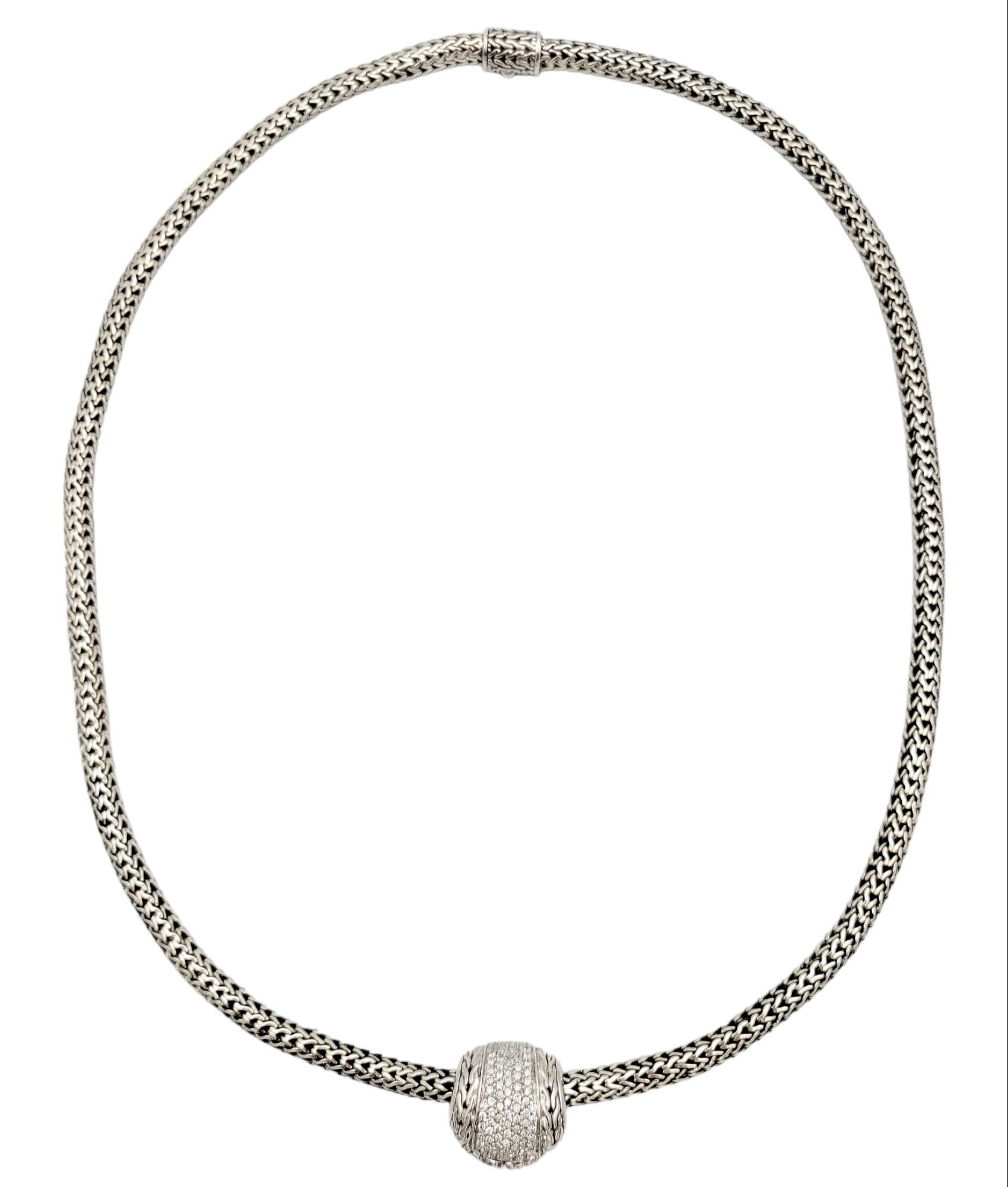 This incredible diamond pave pendant & classic chain was designed by John Hardy. Inspired by Bali and its time-honored jewelry-making traditions, John Hardy was founded in 1975 with a dedication to sustainable handcrafted jewelry. This elegant piece
