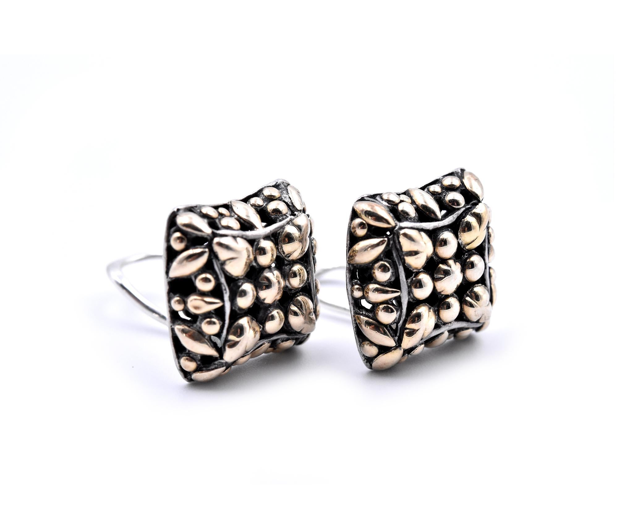 Designer: John Hardy
Material: sterling silver and 18k yellow gold
Dimensions: earrings are approximately 16.44mm by 16.04mm
Fastenings: clip-on with omega backs
Weight: 9.6 grams
Retail: $650
