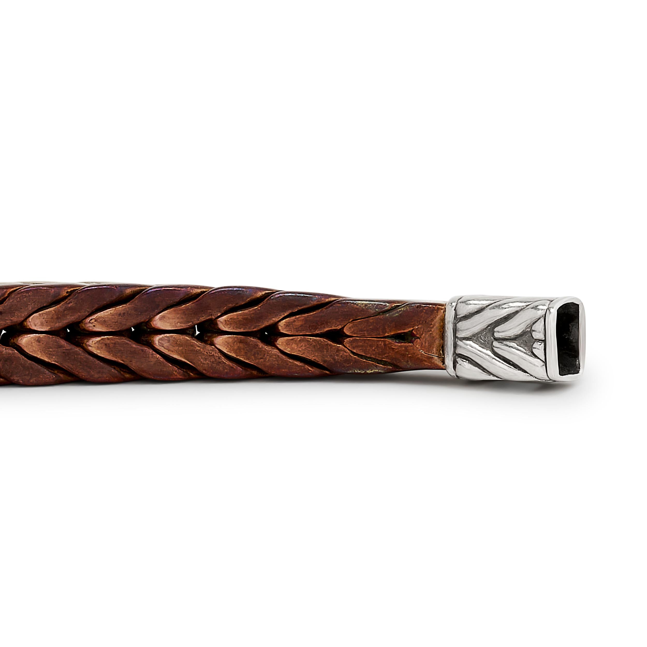 A striking John Hardy bracelet featuring a hand-woven spiga wheat chain design in a blend of oxidized silver and warm copper.

Length: Approximately 8