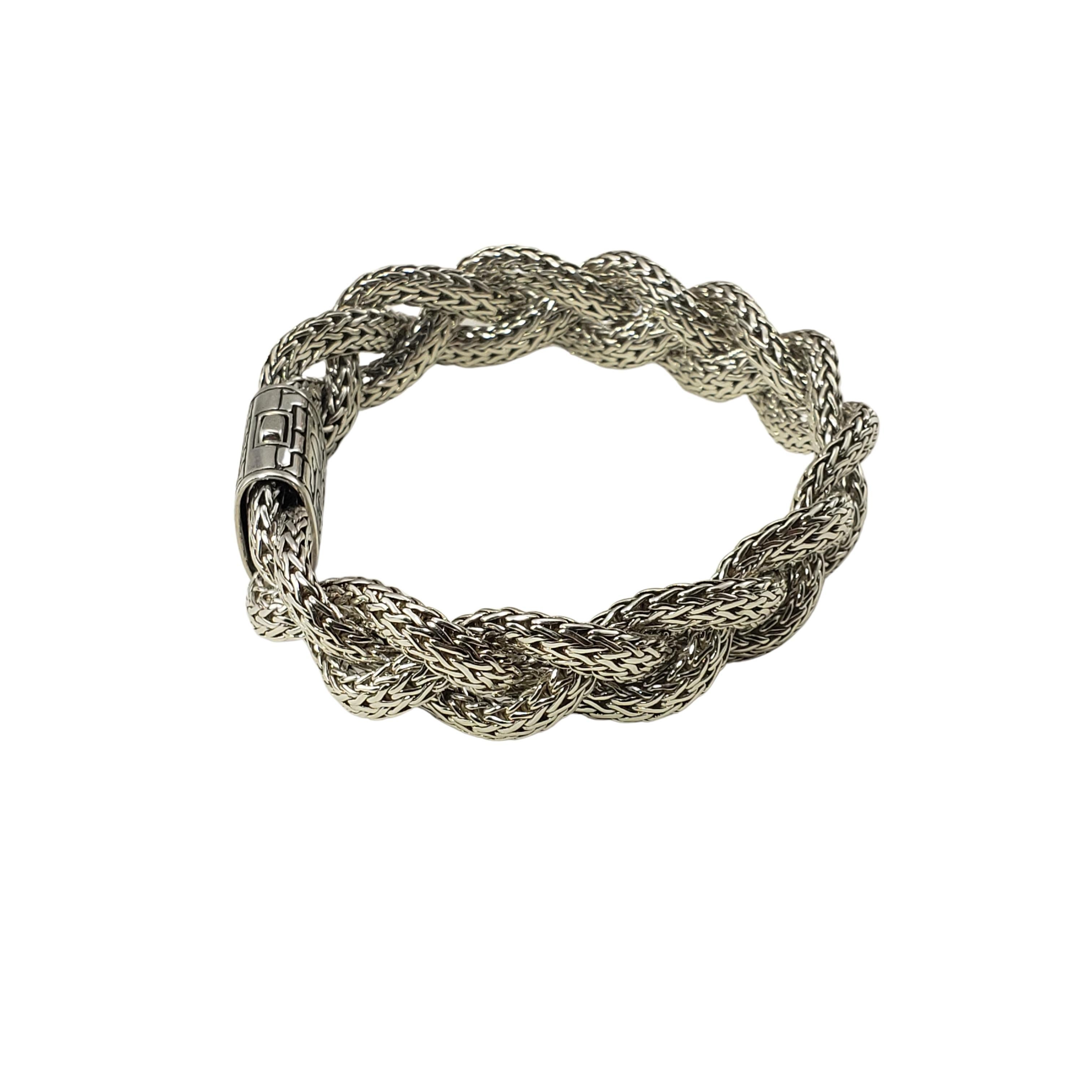 John Hardy Sterling Silver Braided Bracelet-

This lovely braided bracelet by John Hardy is crafted in beautifully detailed sterling silver.  Push lock closure.  Width:  1/2  inch.
Push lock closure.

Size: 8 inches

Weight:  37.4 dwt. /  58.3
