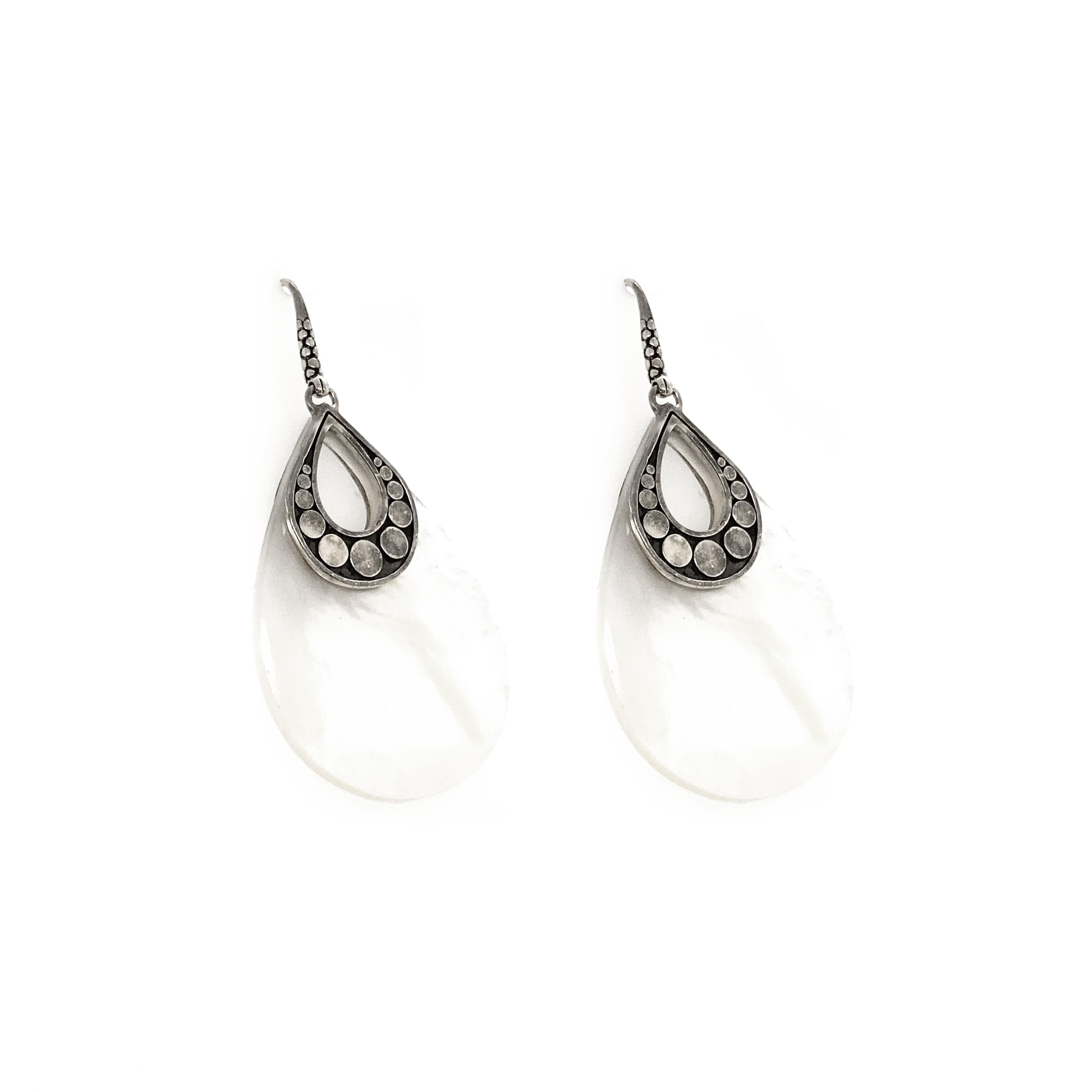 Sterling silver and white mother of pearl drop earrings from the Dot collection. 58mm long. French wire backs.