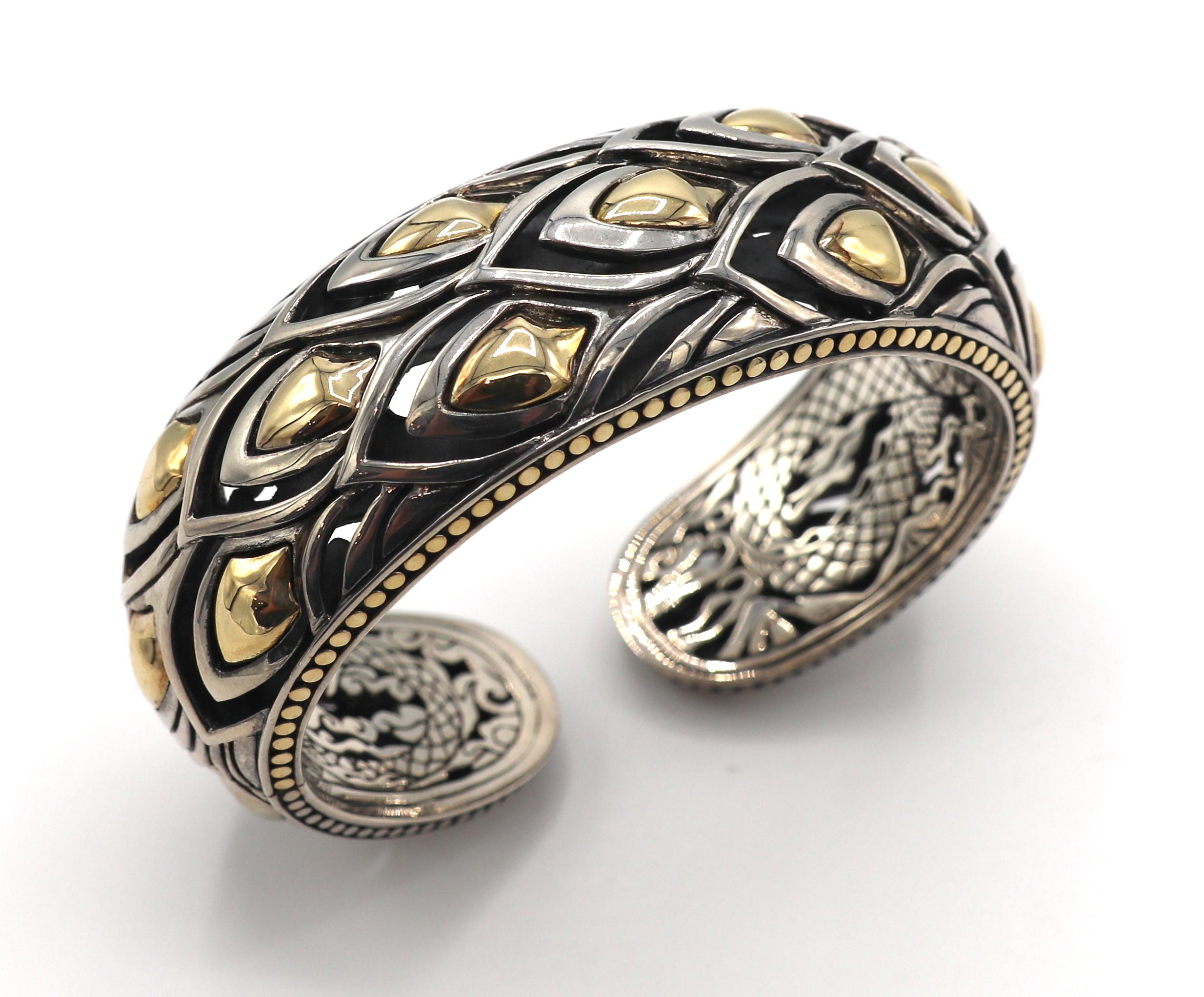 John Hardy Sterling Silver & Gold Naga Kick Cuff Dragon Scale Bracelet 
Metal: Sterling silver & 18k yellow gold
Weight: 98.4 grams
Width: 24mm
Inner diameter: 62mm
Outer diameter: 75mm
Length: Fits approx. 6.75