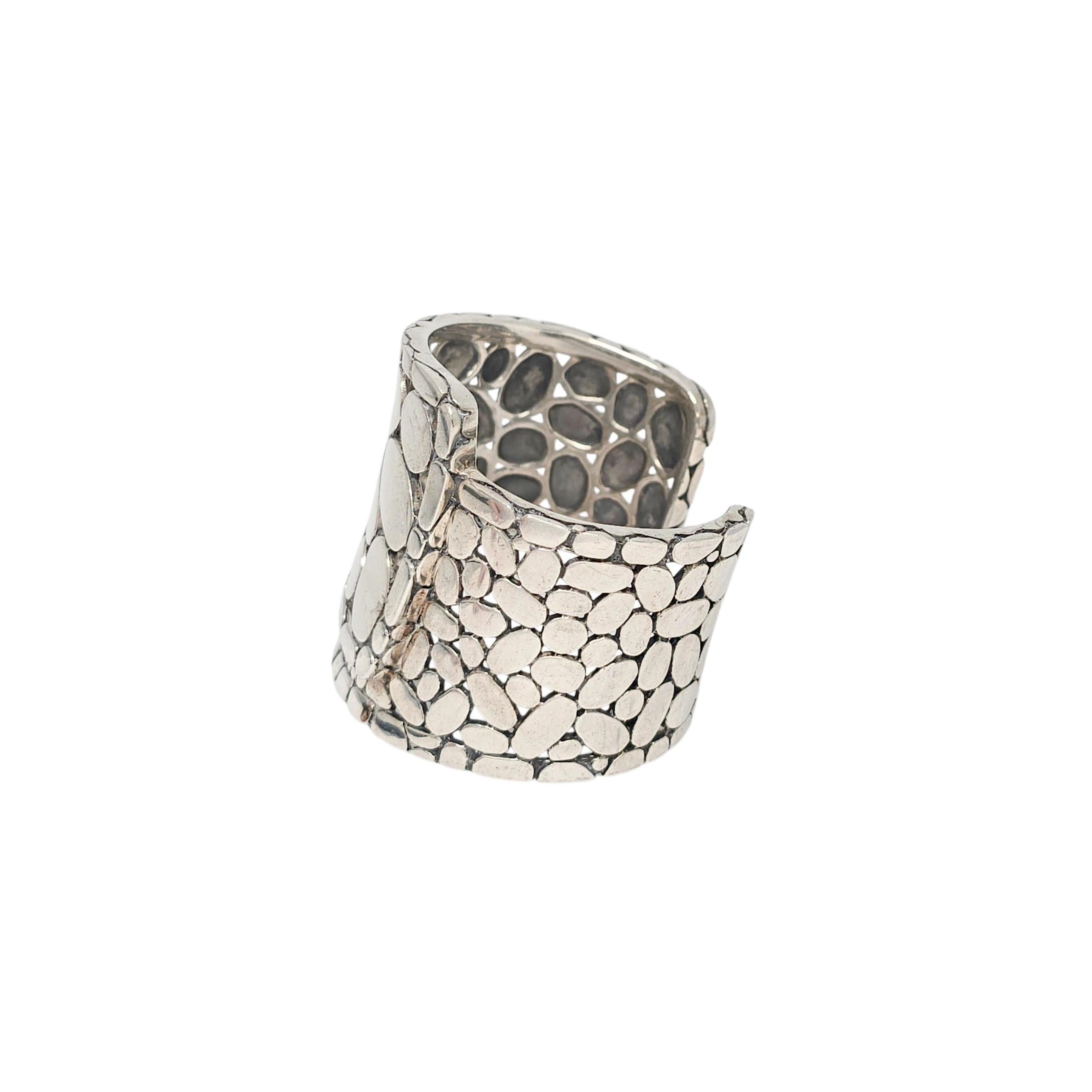 John Hardy sterling silver Kali Wide Overlap cuff bracelet.

A large, substantial cuff bracelet featuring an open pebble design.

Weighs approx 76.8g, 49.4dwt

Measures approx 6