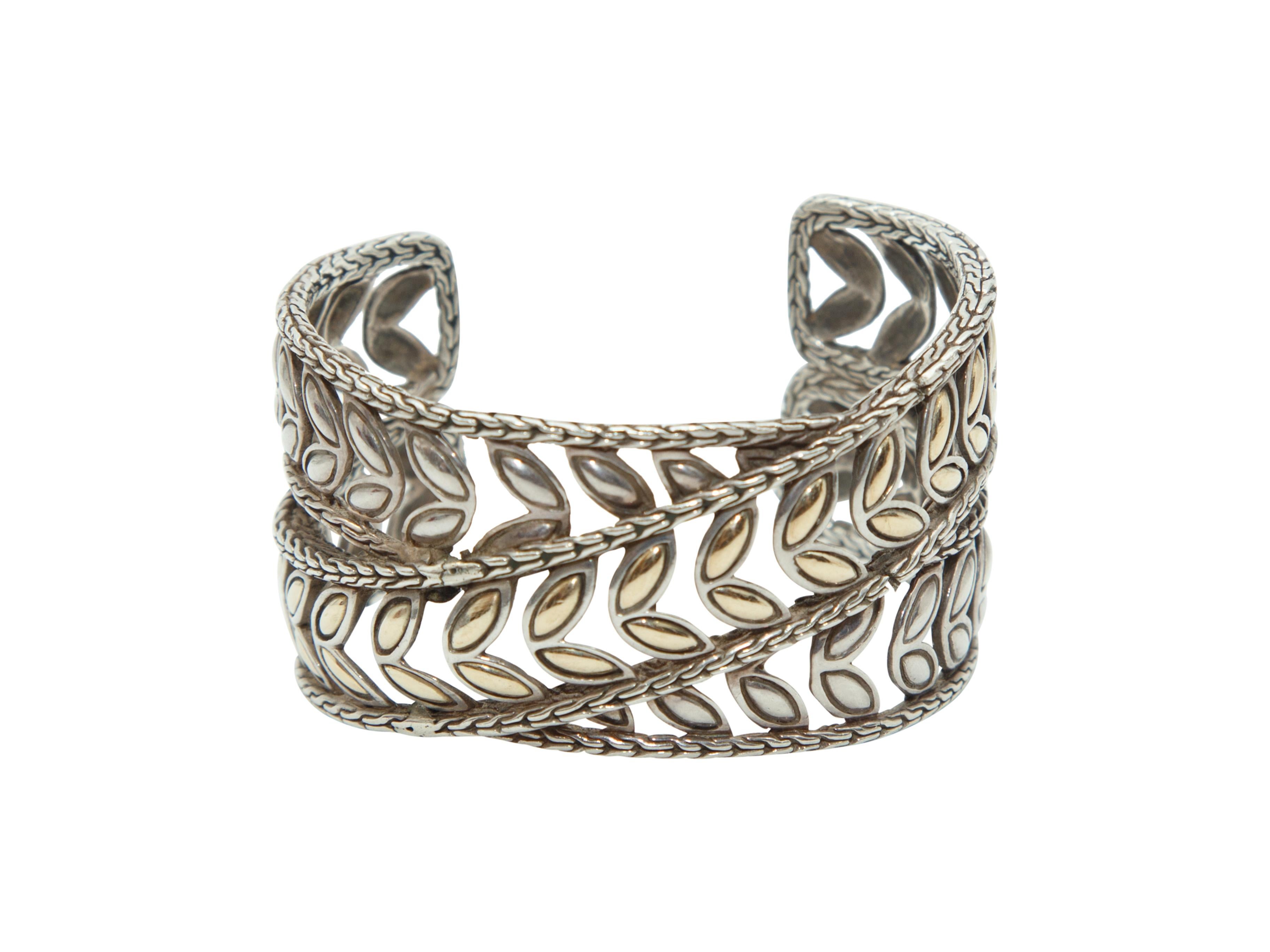 Product details:  Sterling silver leaf cuff bracelet by John Hardy.  6