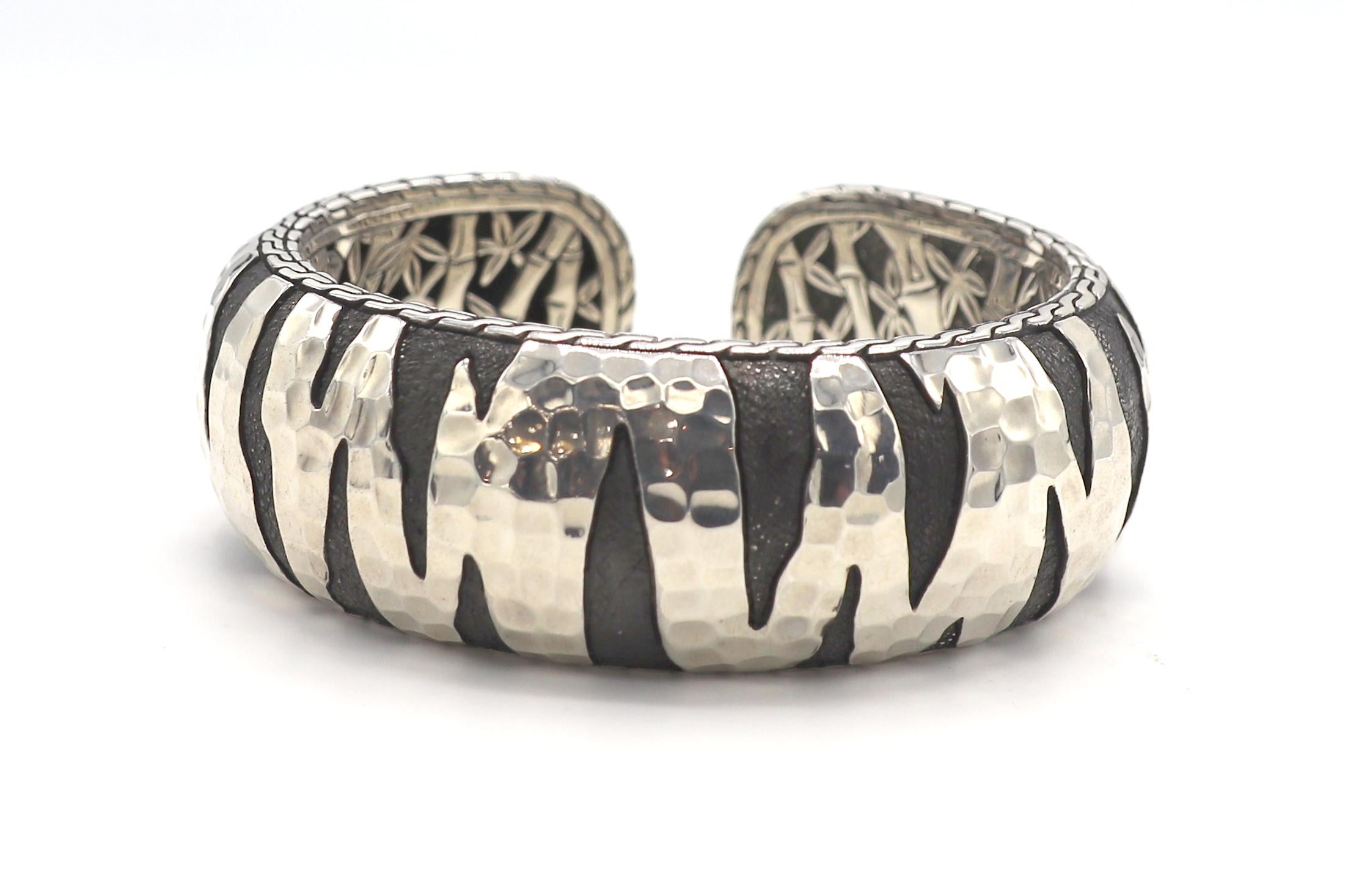 John Hardy Sterling Silver Macan Tiger Stripe Kick Cuff Bangle Bracelet
Metal: Sterling silver
Weight: 88.66 grams
Width: 25.5mm
Length: Fits approx. 6.75