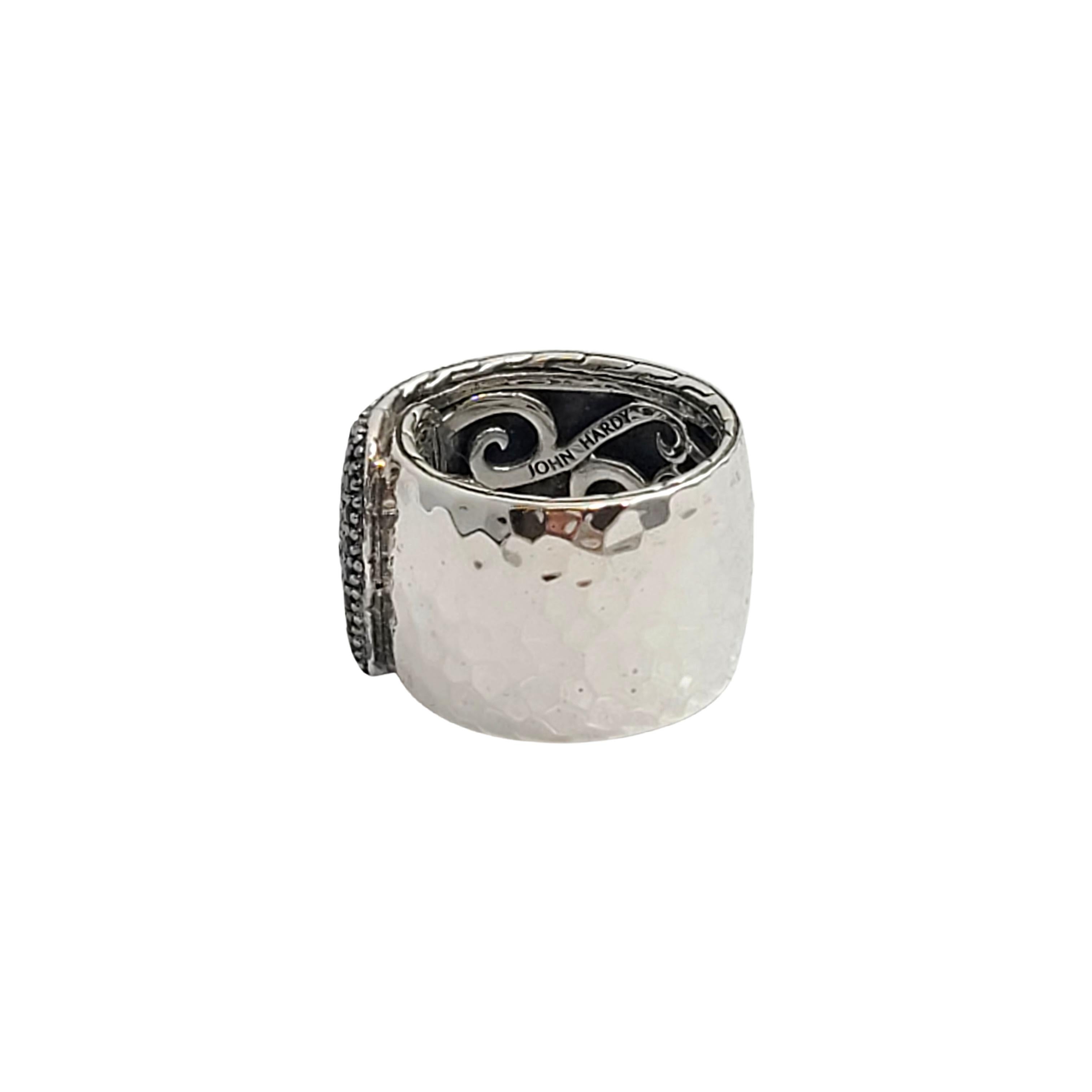 Sterling silver Palu Lava black sapphire overlap band ring by John Hardy.

Size 7

This beautiful sterling silver band has a slightly hammered finish and features 3 rows of small round faceted black sapphires with an overlap design.

Measures approx