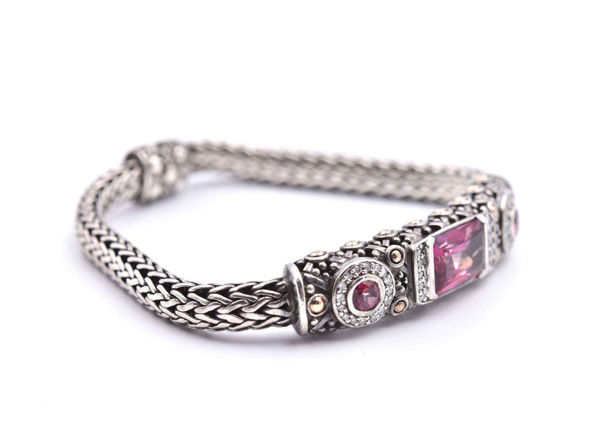 Designer: John Hardy
Material: sterling silver
Gemstone: pink tourmaline
Dimensions: bracelet will fit a 6 ½ inch wrist 
Weight: 32.70 grams

