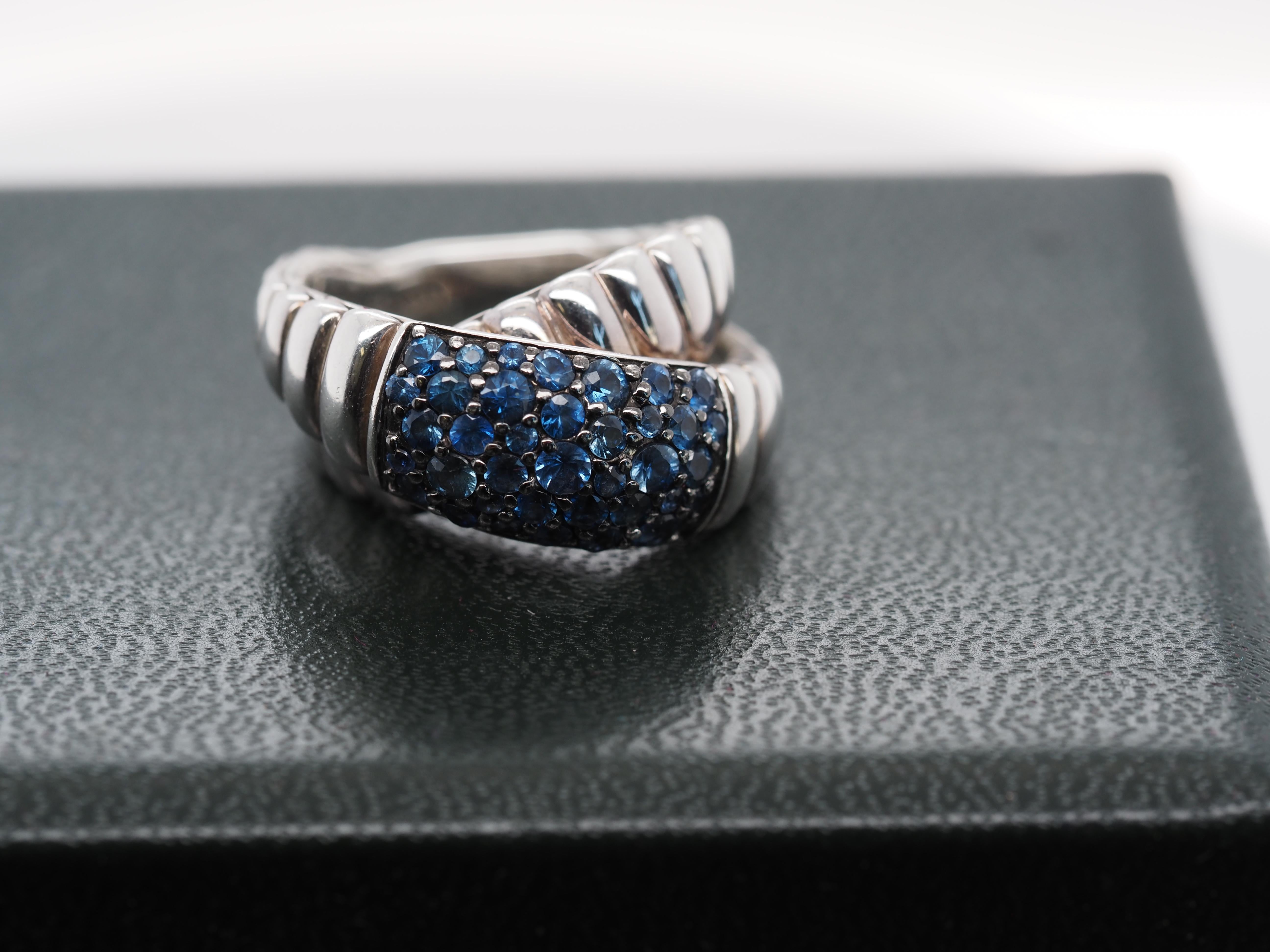Item Details:
Maker: John Hardy
Ring Size: 7.25
Metal Type: Sterling Silver [Hallmarked, and Tested]
Weight: 11.6 grams
‌
Sapphire Details:
Weight: .90ct, total weight
Cut: Round
Color: Blue
‌
Band Width: 5.0 mm
Condition: Excellent