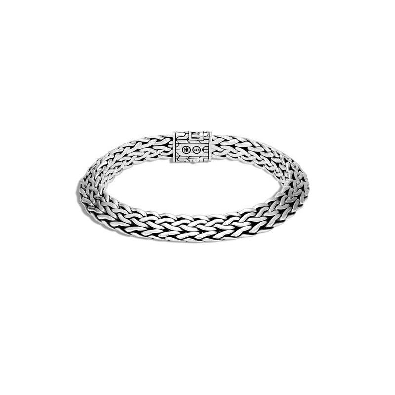  Tiga references the harmony of self, soul and nature. Wear it alone or stack it up.
Sterling Silver
Bracelet is 9.5mm wide
Pusher Clasp
Size Medium
BB900084XM

