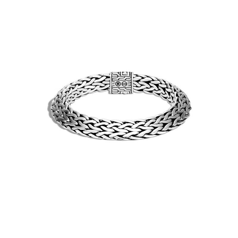 Tiga references the harmony of self, soul and nature. Wear it alone or stack it up.
Sterling Silver
Bracelet is 11mm wide
Pusher Clasp
Size Medium
BB900085XM
