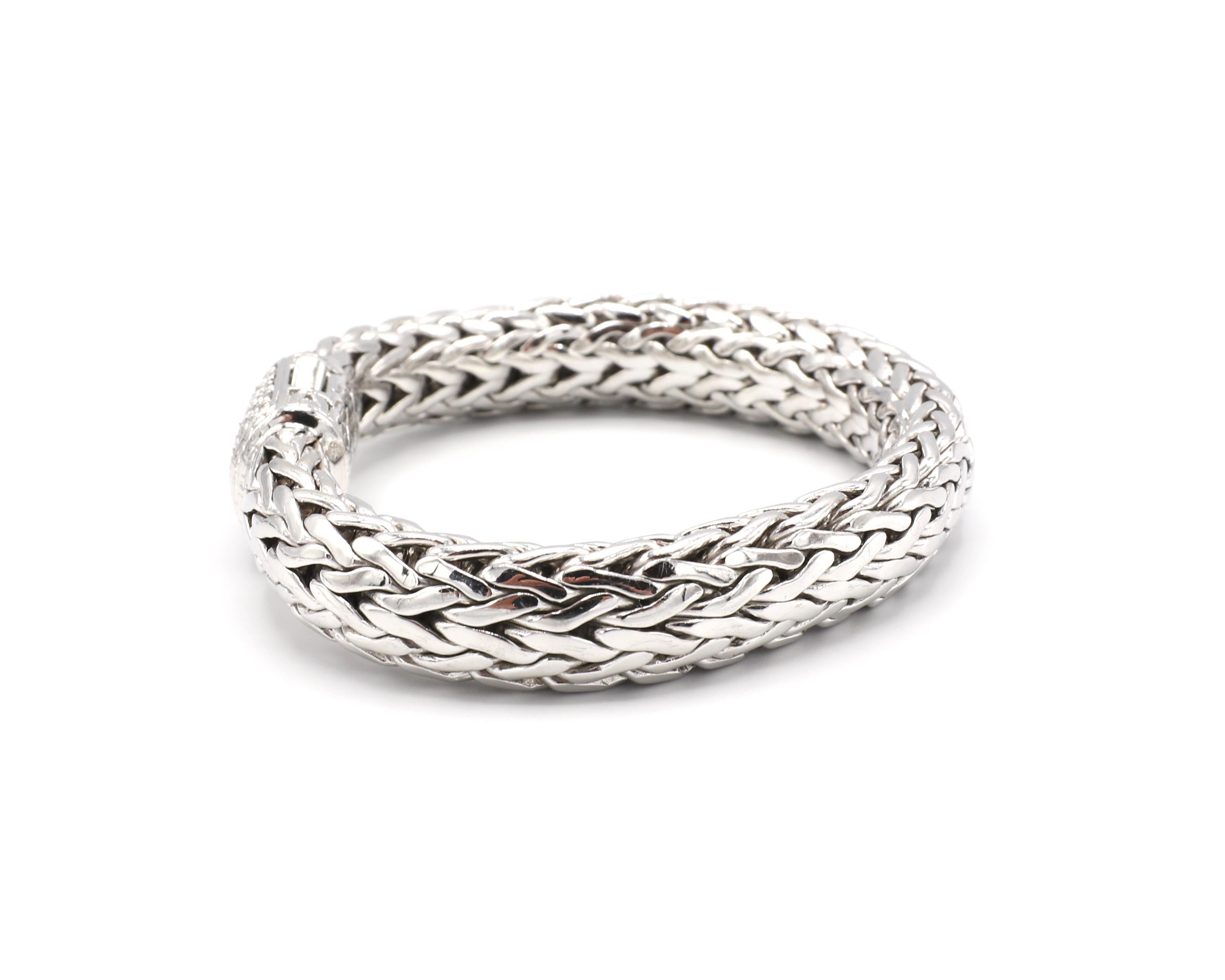 John Hardy Tiga Large Sterling Silver & 18K Gold Classic Chain Woven Diamond Bracelet 

Metal: Sterling silver & 18k gold
Weight: 86.8 grams
Diamonds: Approx. 0.65 CTW G VS
Length: 8 inches
Width: Approx. 10.5mm, clasp is approx. 13.2mm wide