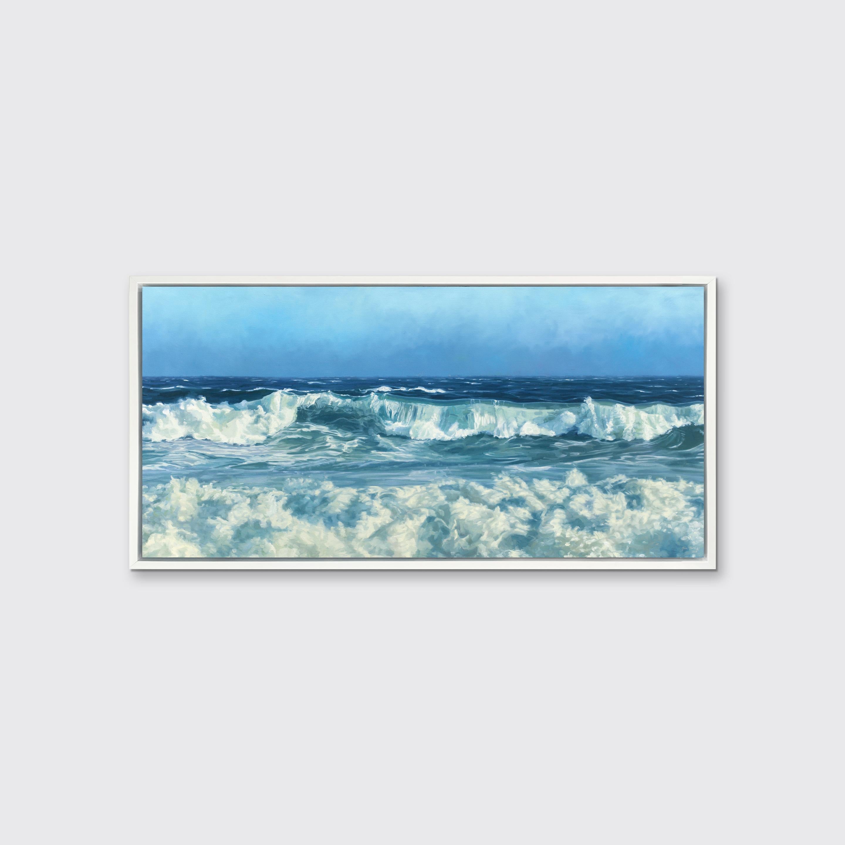 This coastal seascape limited edition print captures a cropped view of rolling waves below an ocean horizon line and a clear blue sky. Highly detailed and realistic, it balances the deep blues of the ocean with white foam and mist created by lightly