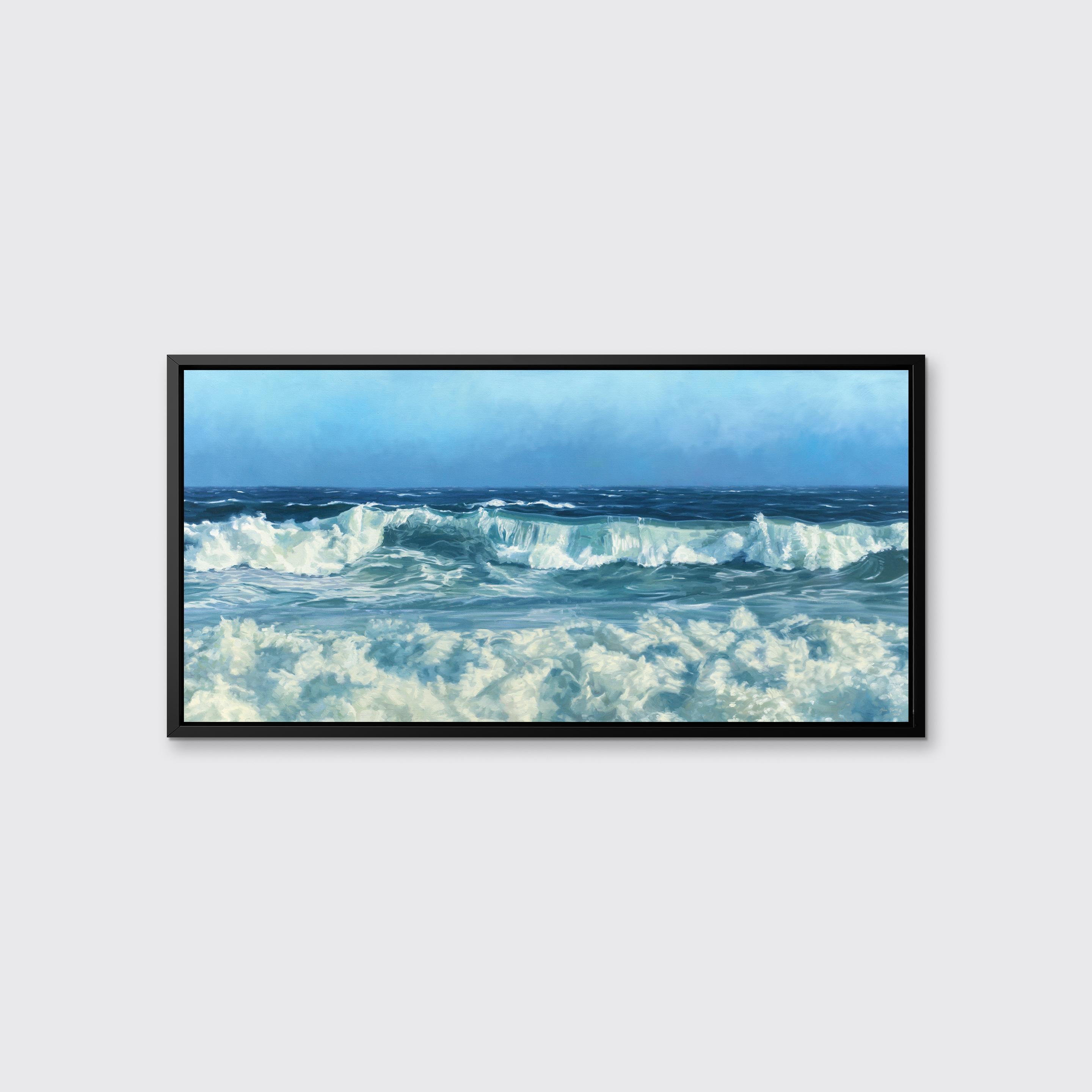 This coastal seascape limited edition print captures a cropped view of rolling waves below an ocean horizon line and a clear blue sky. Highly detailed and realistic, it balances the deep blues of the ocean with white foam and mist created by lightly