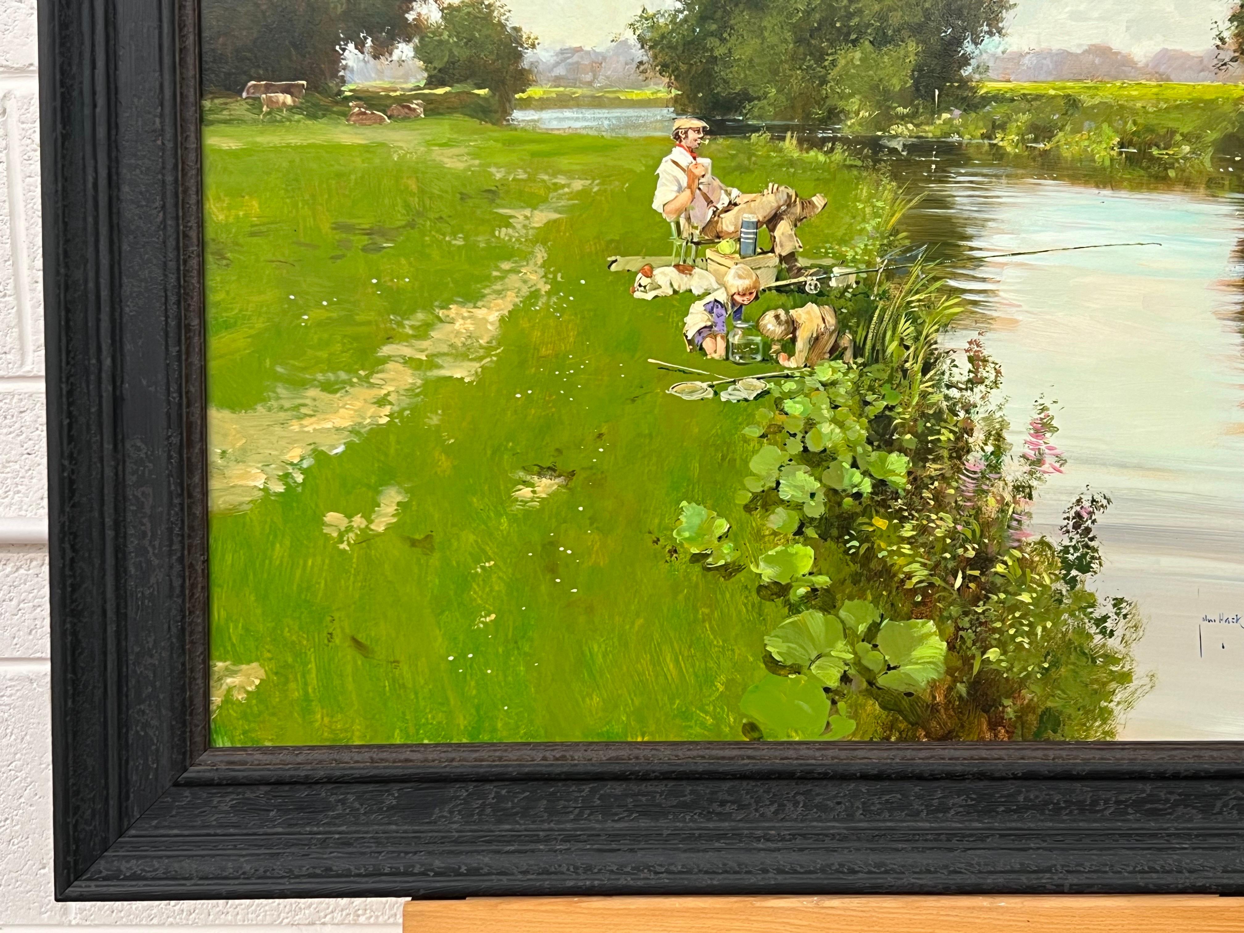 Man Fishing with Children Playing at a River Side in the English Countryside For Sale 1