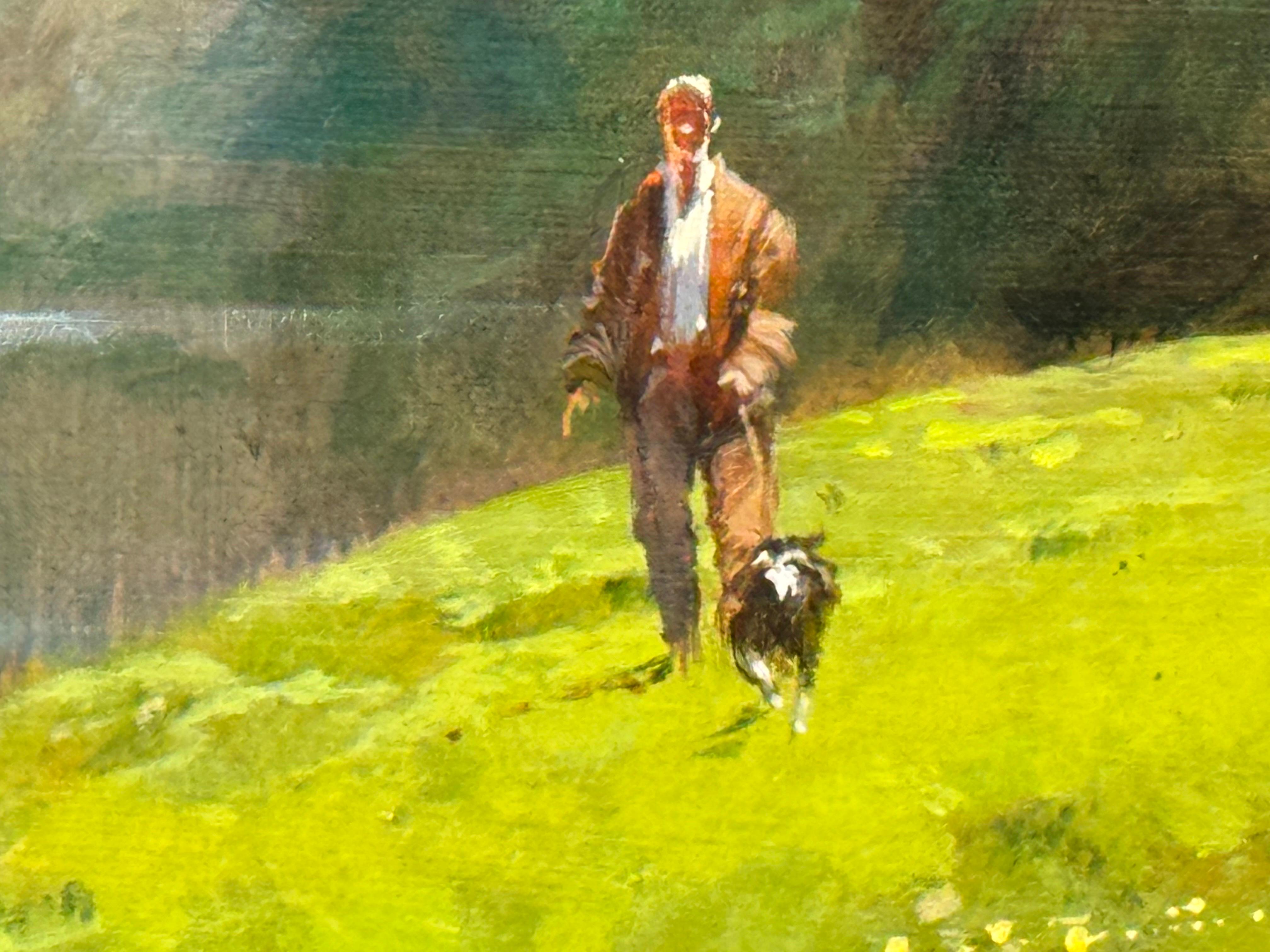 Hombre paseando al perro junto a un río en la exuberante campiña inglesa - Landscape Painting Marrón de John Haskins