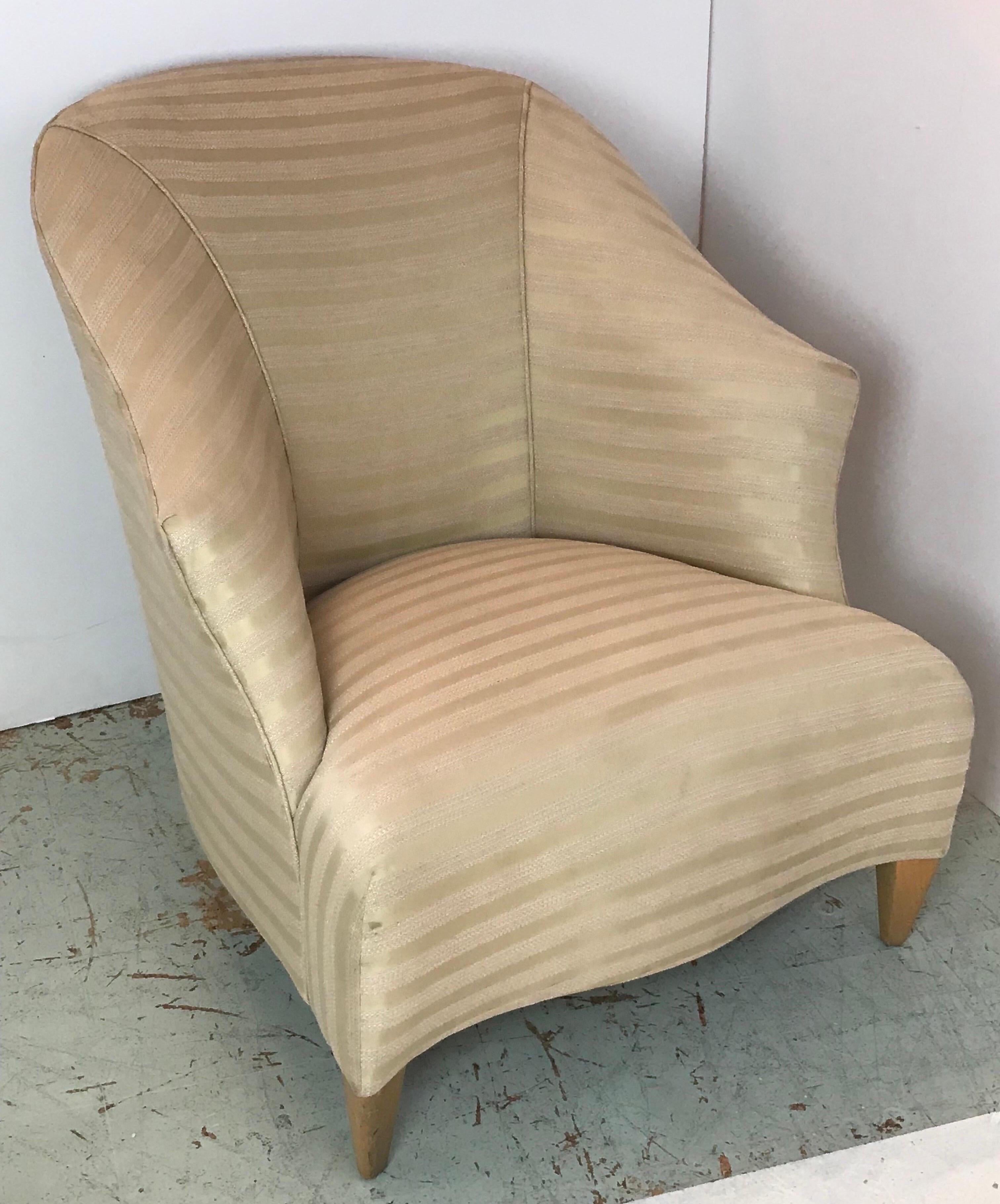 A rare 1990’s John Hutton Designs for Donghia club chair from a series of updates to classical lines with an anthropomorphic slightly exaggerated design motif of era titled alternately Ghost and Spirit. This Club chair bears the hallmarks of chairs